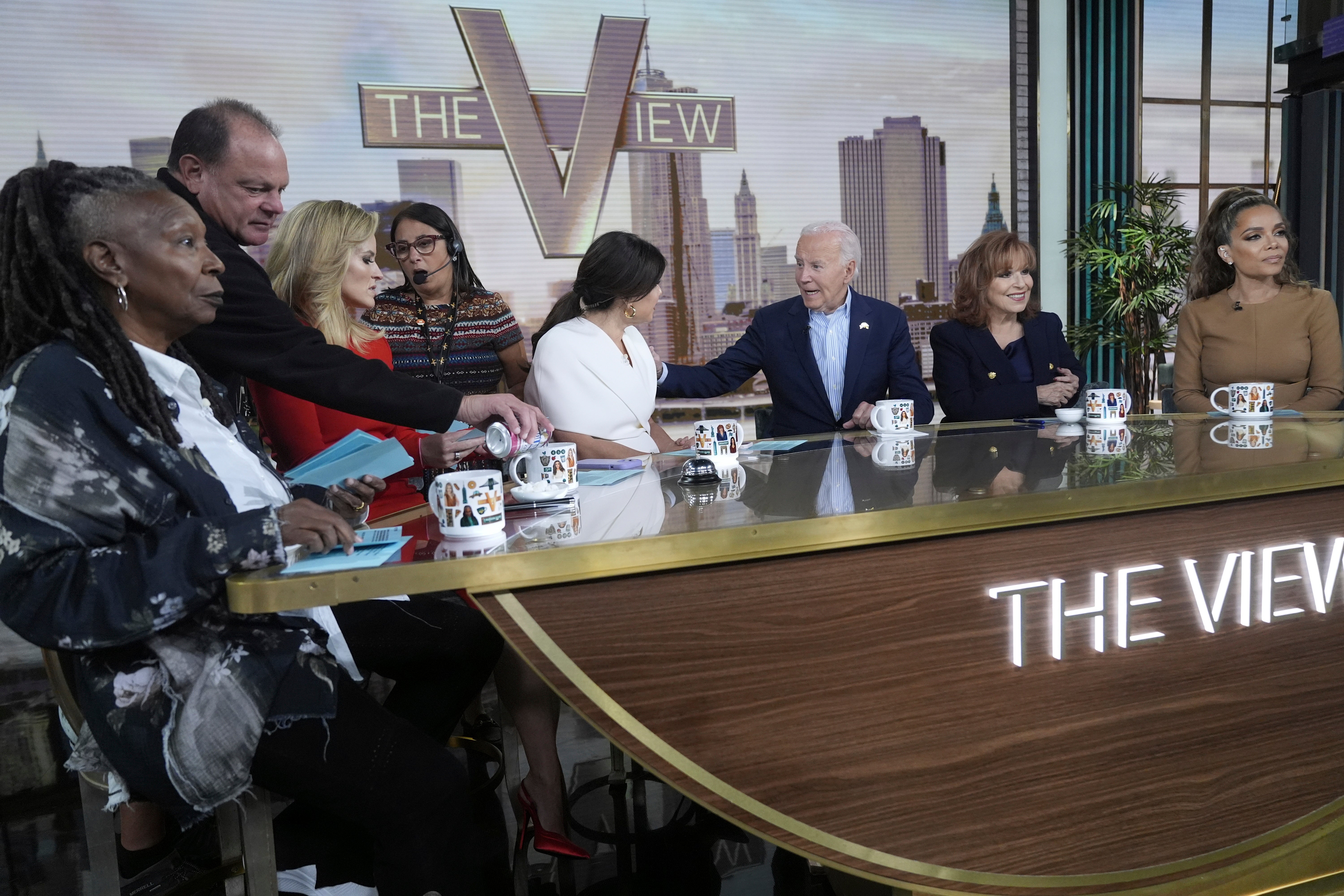 President Joe Biden joins ABC's "The View" for a live interview in New York, Wednesday, Sept. 25, 2024. With the President are Whoopi Goldberg, Joy Behar, Sunny Hostin, Sara Haines, Alyssa Farah Griffin and Ana Navarro. (AP Photo/Manuel Balce Ceneta)