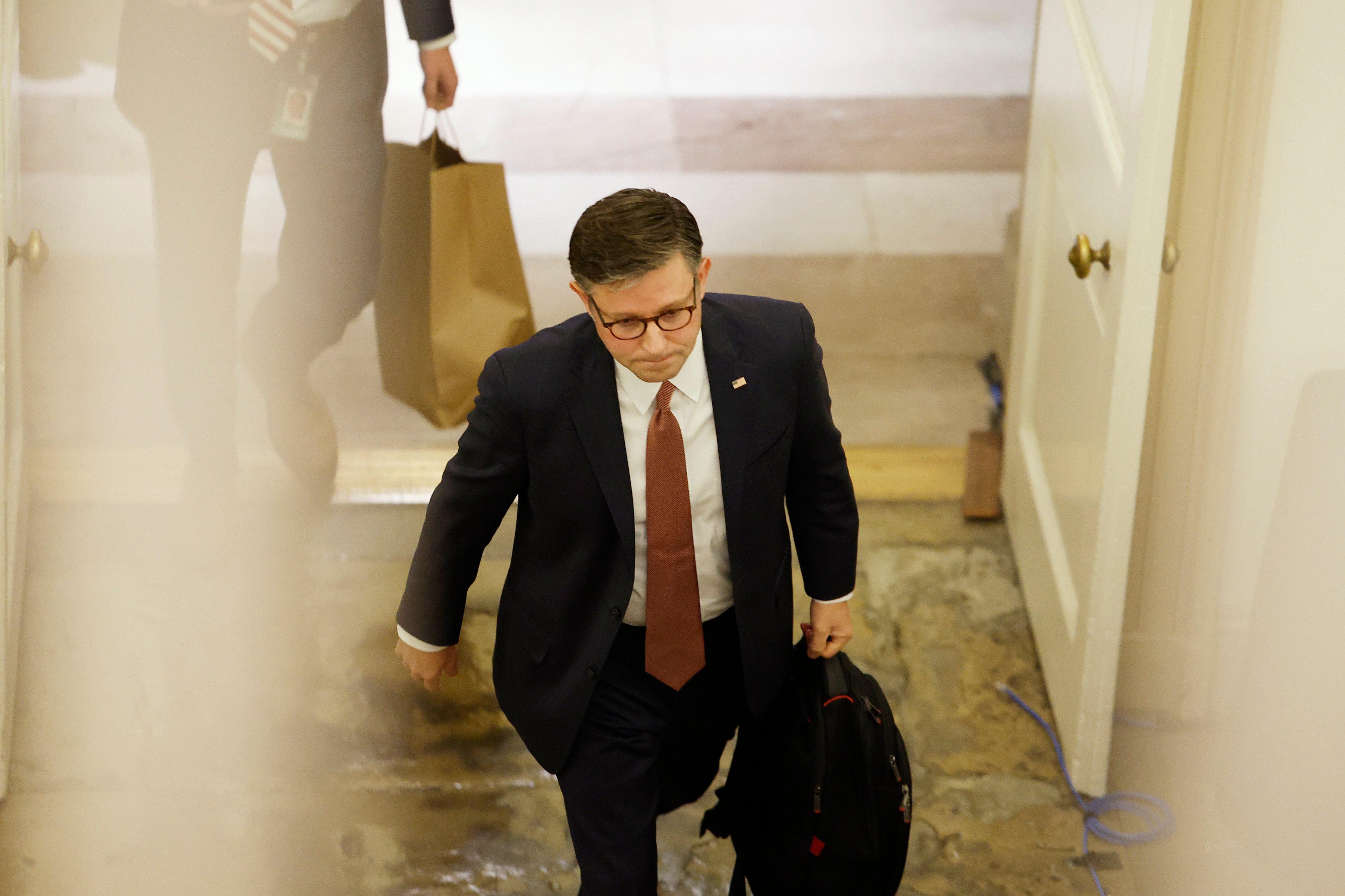 WASHINGTON, DC - SEPTEMBER 25: U.S. Speaker of the House Mike Johnson (R-LA) walks to his office in the U.S. Capitol Building on September 25, 2024 in Washington, DC. Later this evening the House of Representatives will vote on legislation to fund government agencies through December that will later be taken up by the Senate. (Photo by Anna Moneymaker/Getty Images)