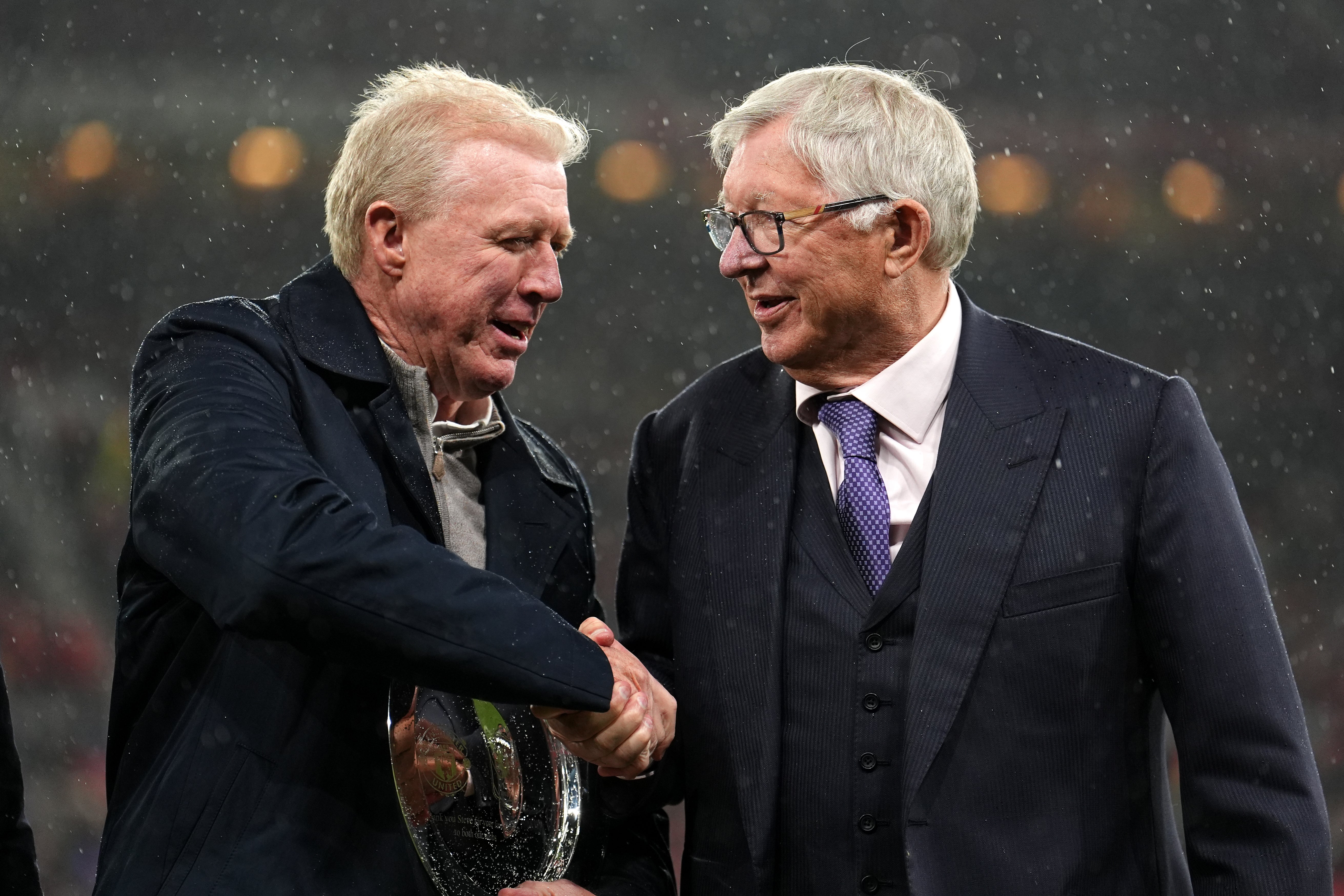 Steve McClaren, left, is presented with a plaque by Sir Alex Ferguson