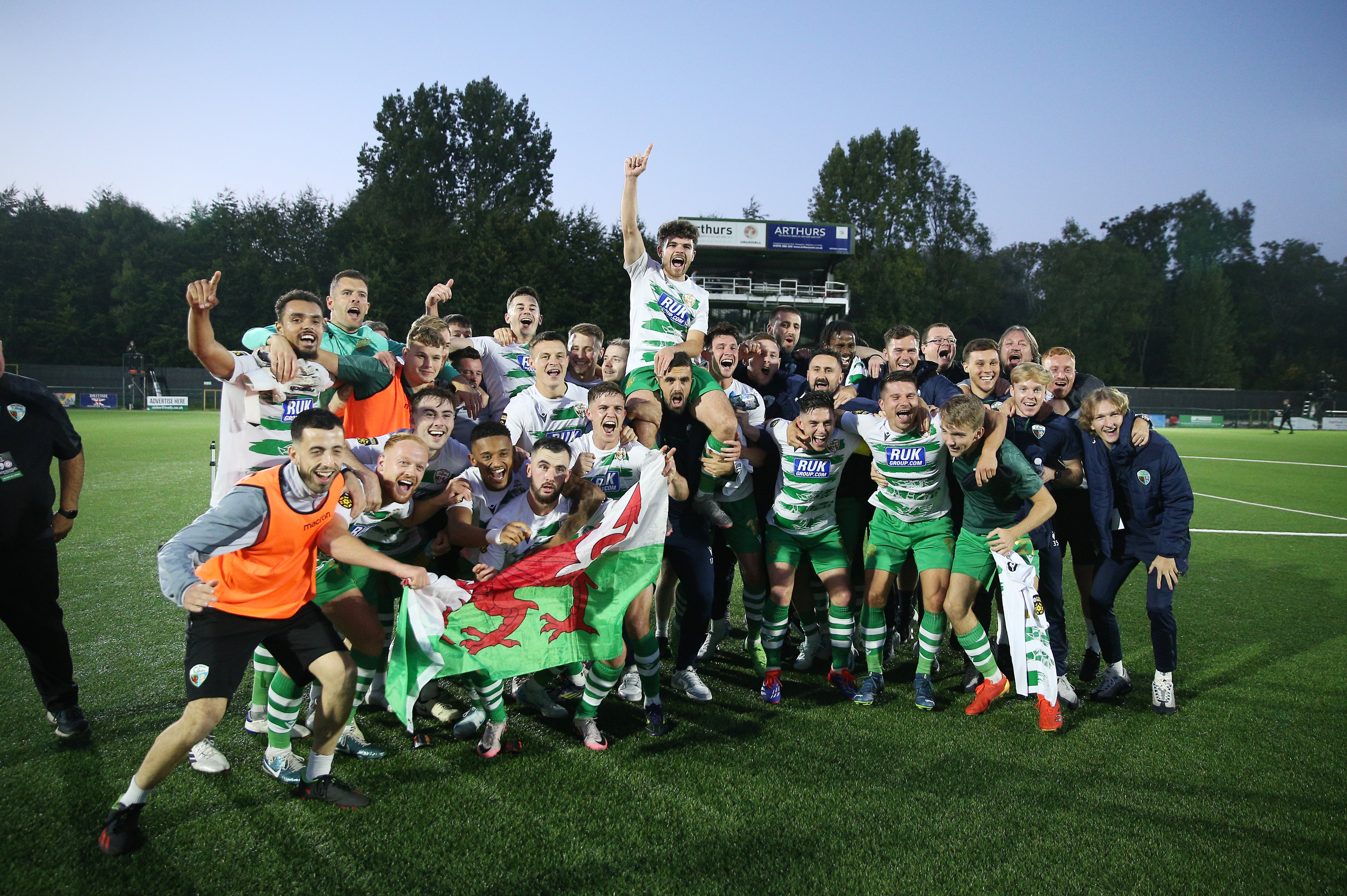 The New Saints players celebrate victory in the Conference League play-off round against Panevezys