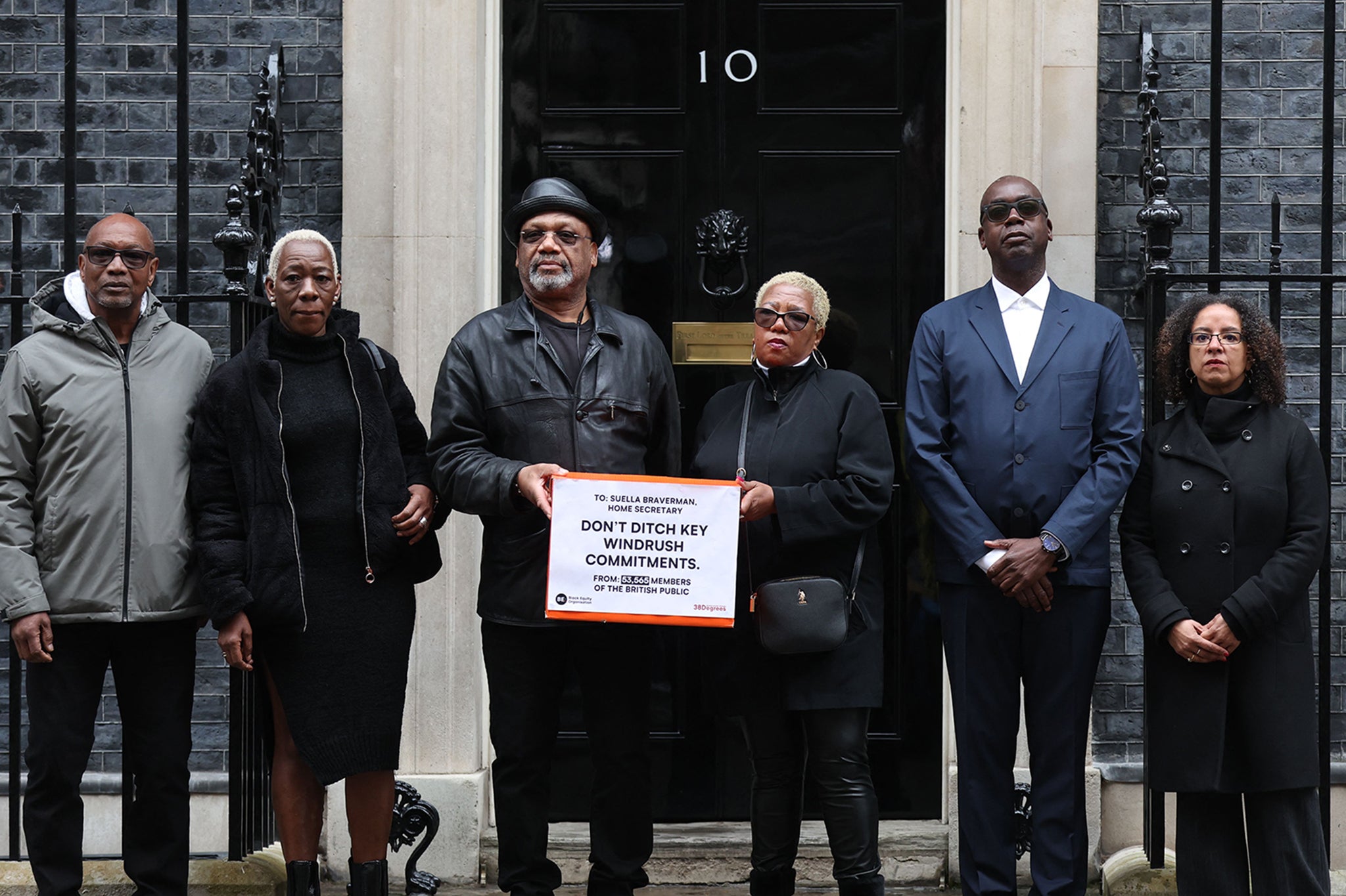 Protesters deliver a petition to Downing Street last year calling on the government to act on the findings of an inquiry into the Windrush scandal