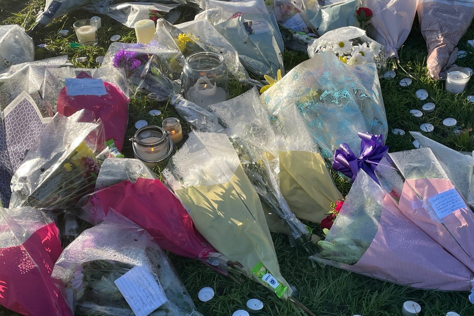 Floral tributes left at the scene in at Stowlawn playing fields in Wolverhampton where Mr Seesahai was attacked