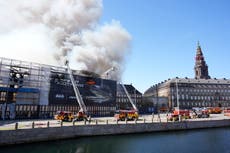 Denmark's king marks reconstruction of famed landmark badly damaged by fire