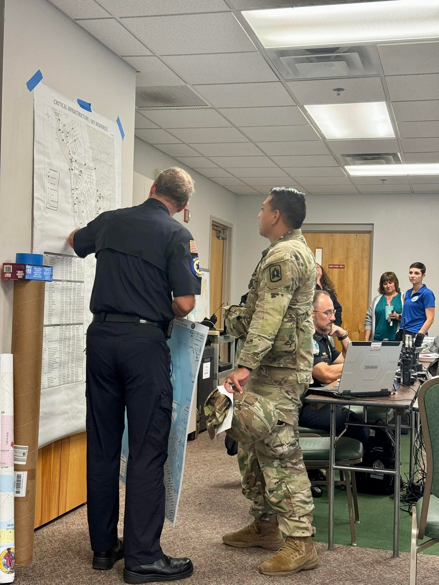 A member of the National Guard works with authorities in Florida’s City of Treasure Island.