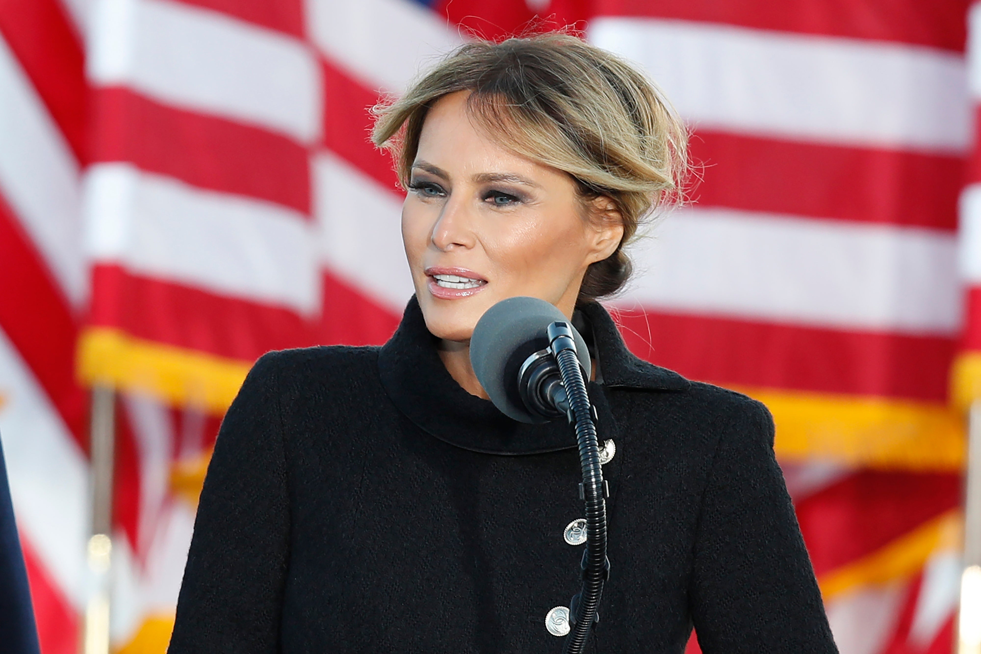 In forthcoming memoir, Trump calls abortion part of a woman’s ‘fundamental right of individual liberty.’ Melania Trump is picture in front of an American flag