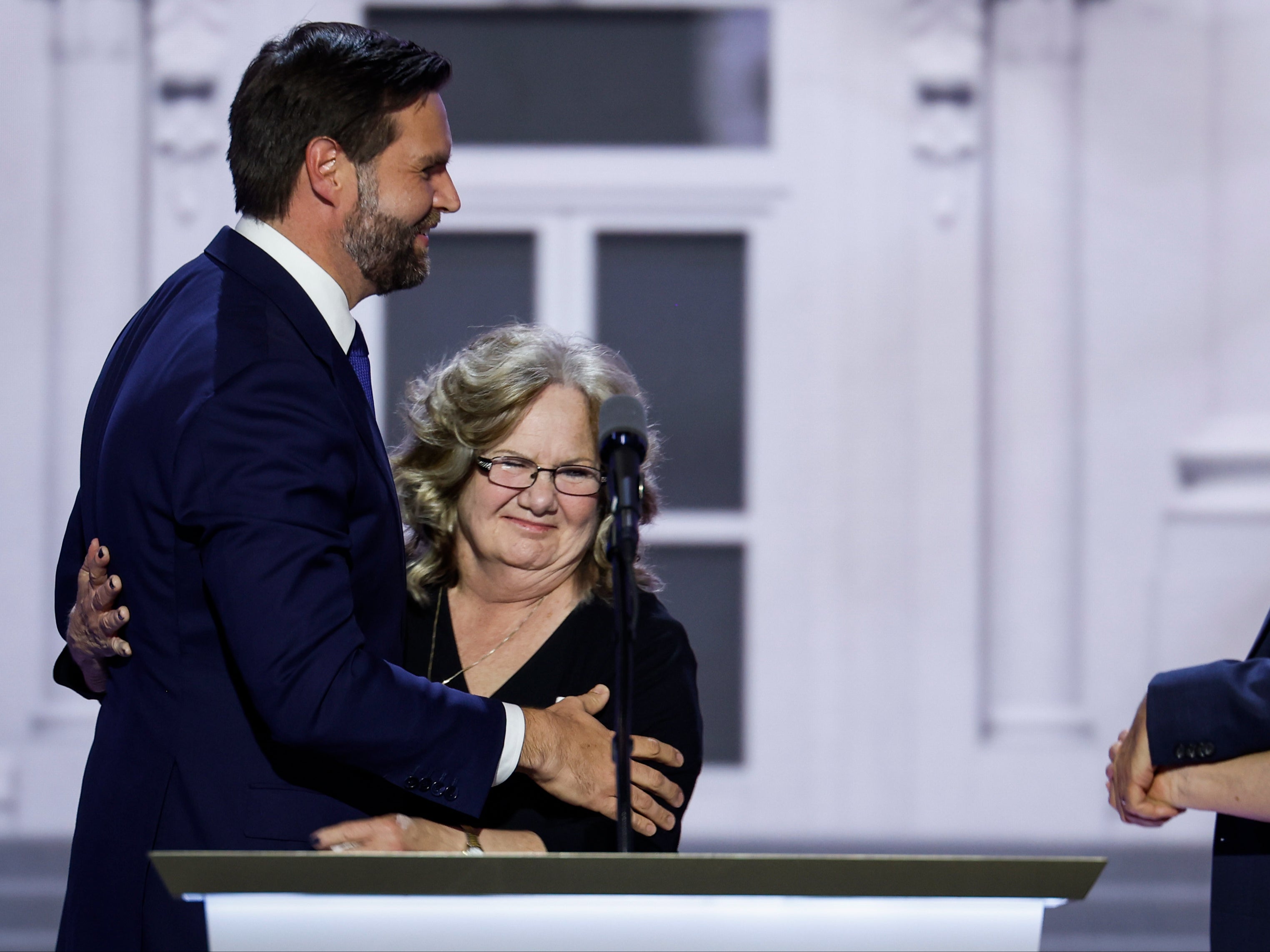 Republican vice presidential candidate, U.S. Sen. J.D. Vance (R-OH) and his mom stand on stage on the third day of the Republican National Convention. She has now revealed how her son became a big Trump backer