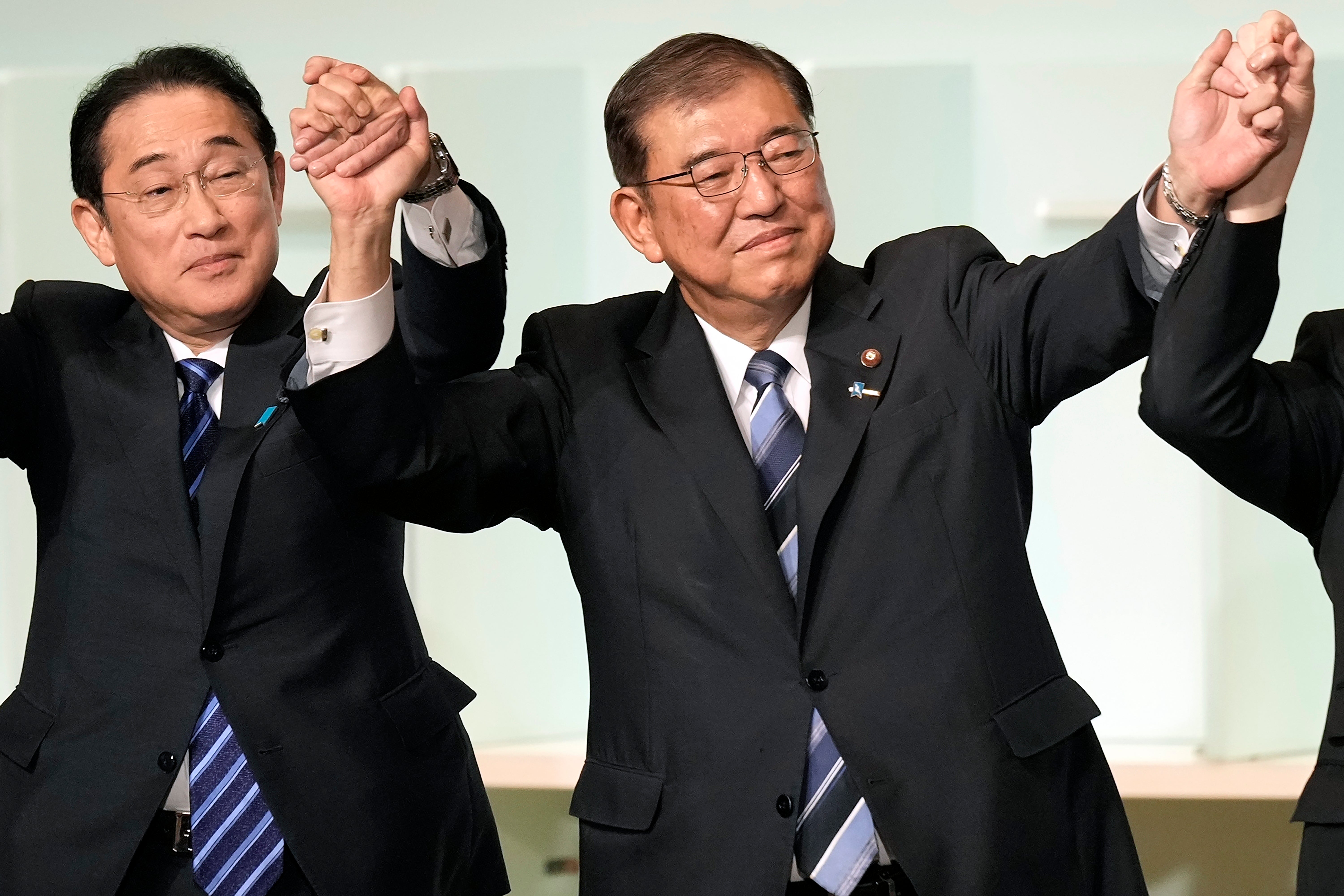 Fumio Kishida, left, resigned as prime minister over the slush fund scandal, even though he was not directly implicated