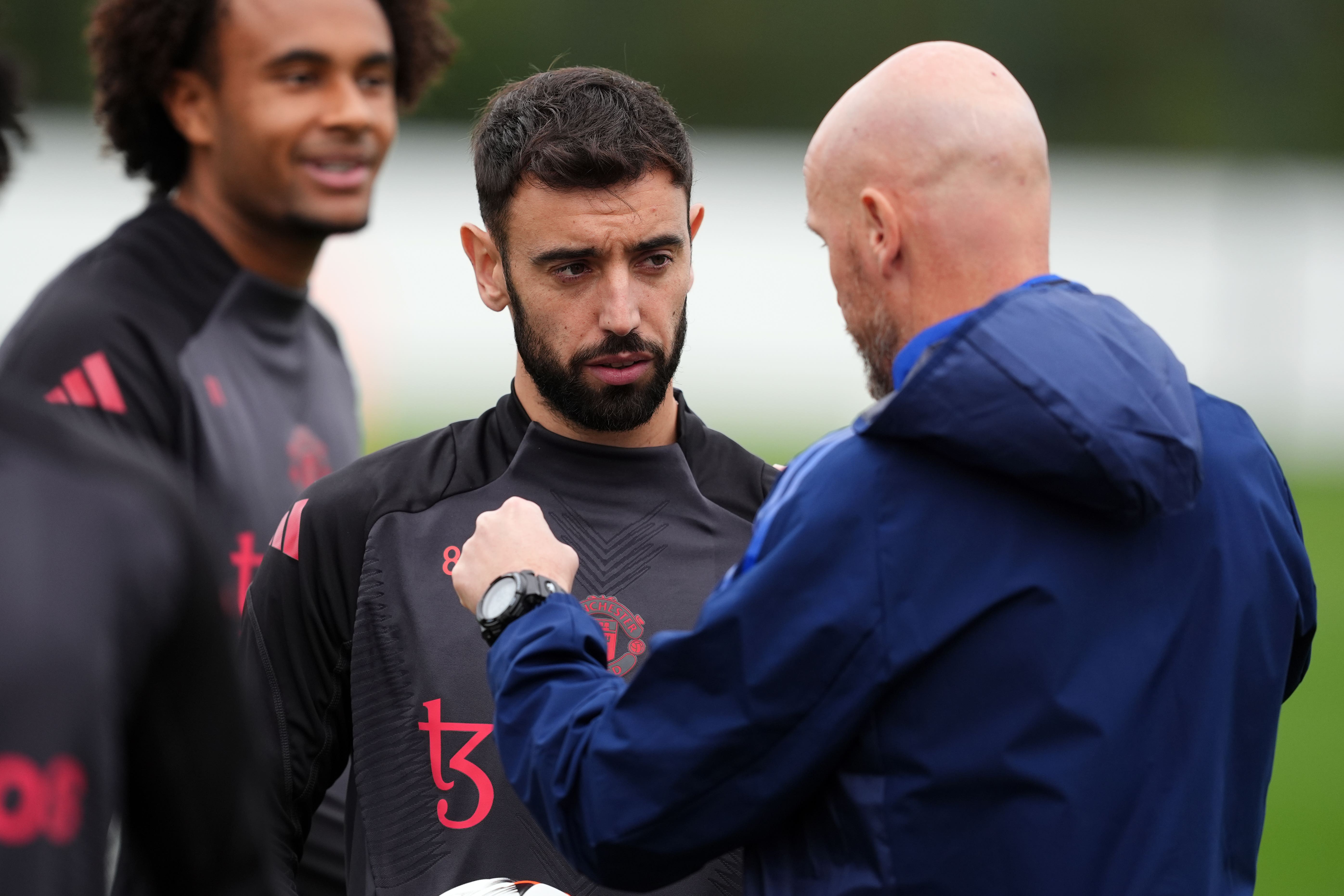 Manchester United manager Erik ten Hag with Bruno Fernandes during a training session earlier this week (Martin Rickett/PA)