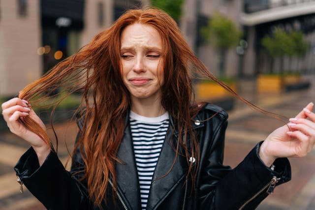 Don’t want the wet weather messing with your hair? (Alamy/PA)