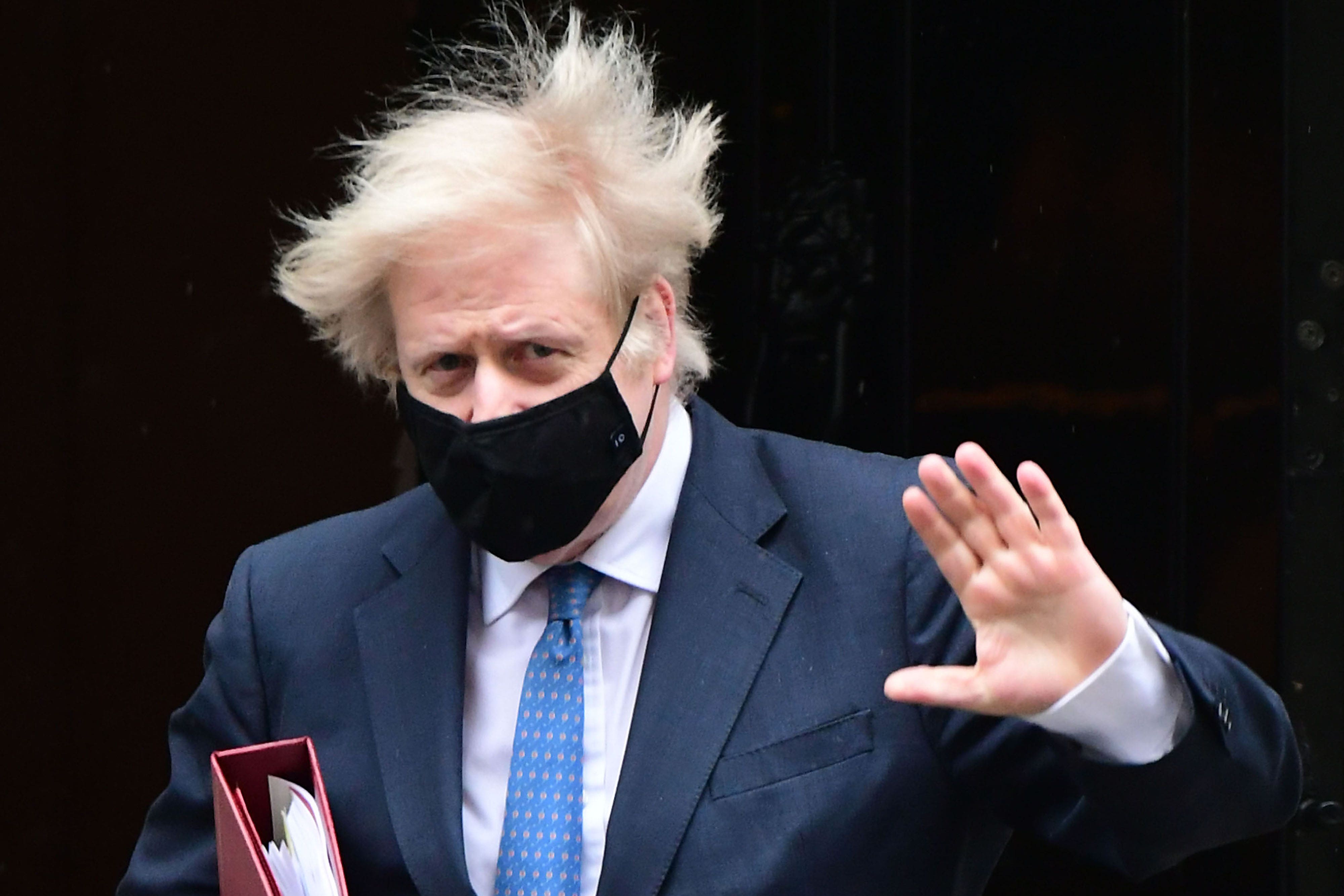 Former prime minister Boris Johnson wearing a mask during Covid lockdowns