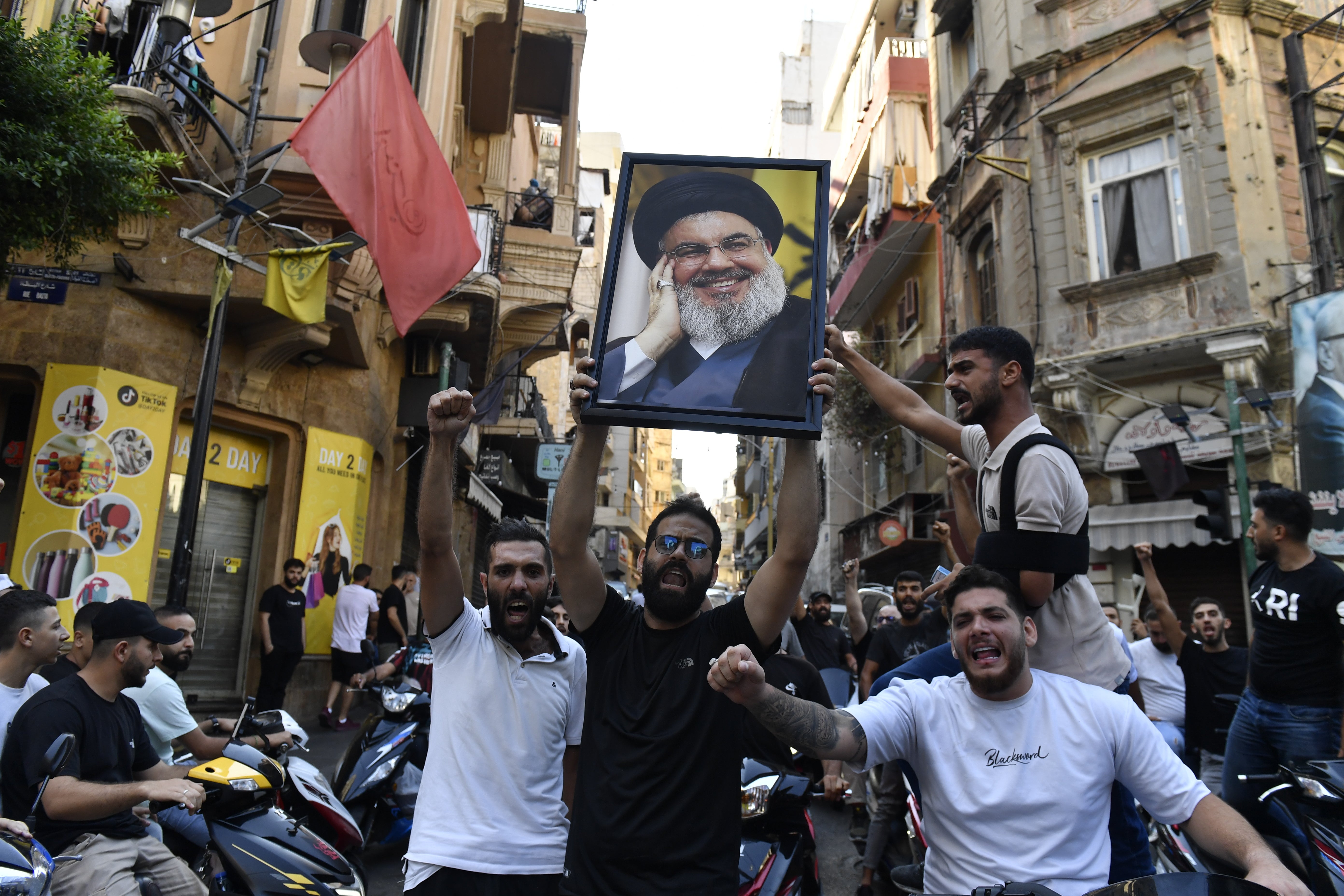 Supporters carried Nasrallah's poster and chanted slogans