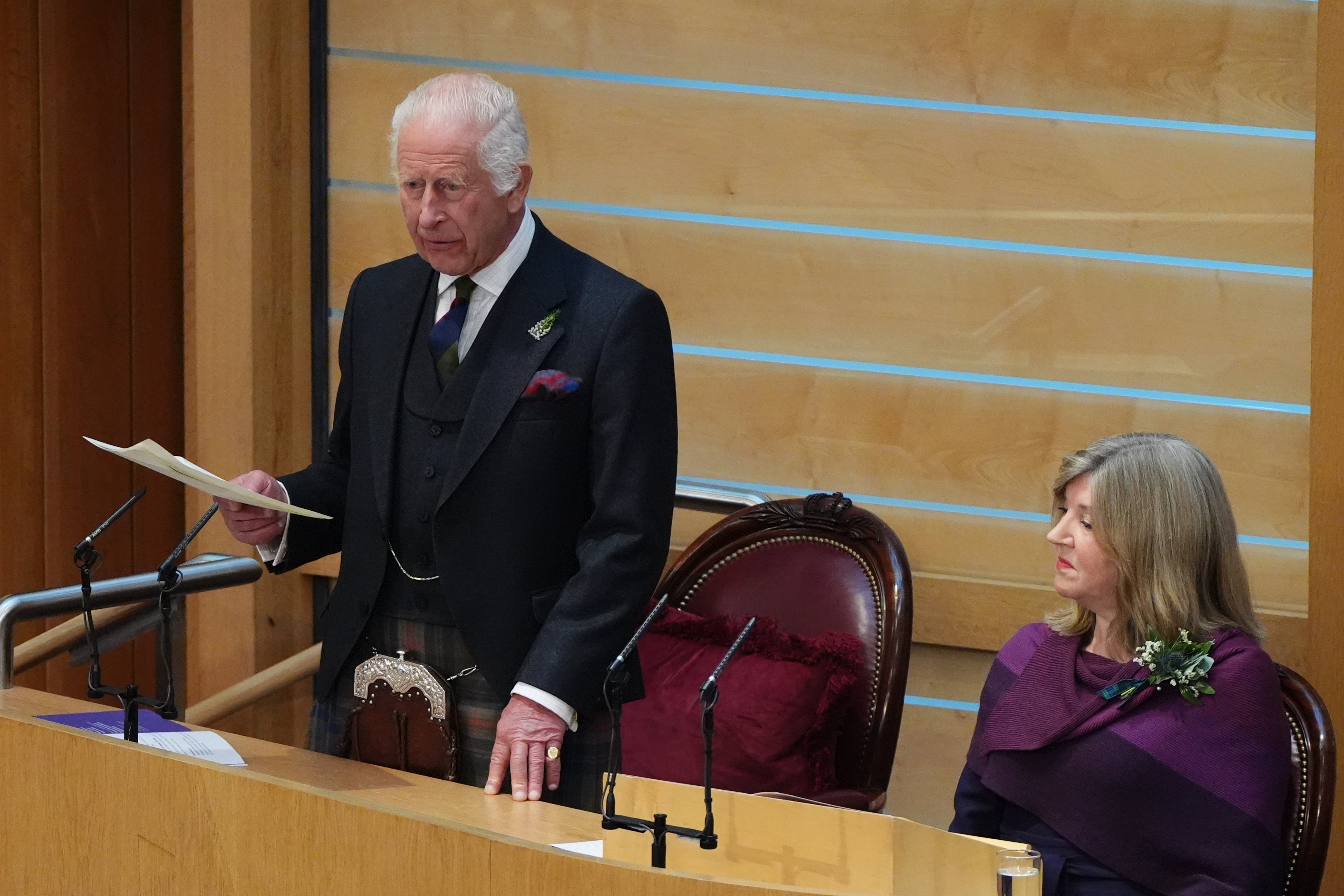 King Charles III addressing the Holyrood Chamber during a visit to the Scottish Parliament in Edinburgh to mark its 25th anniversary