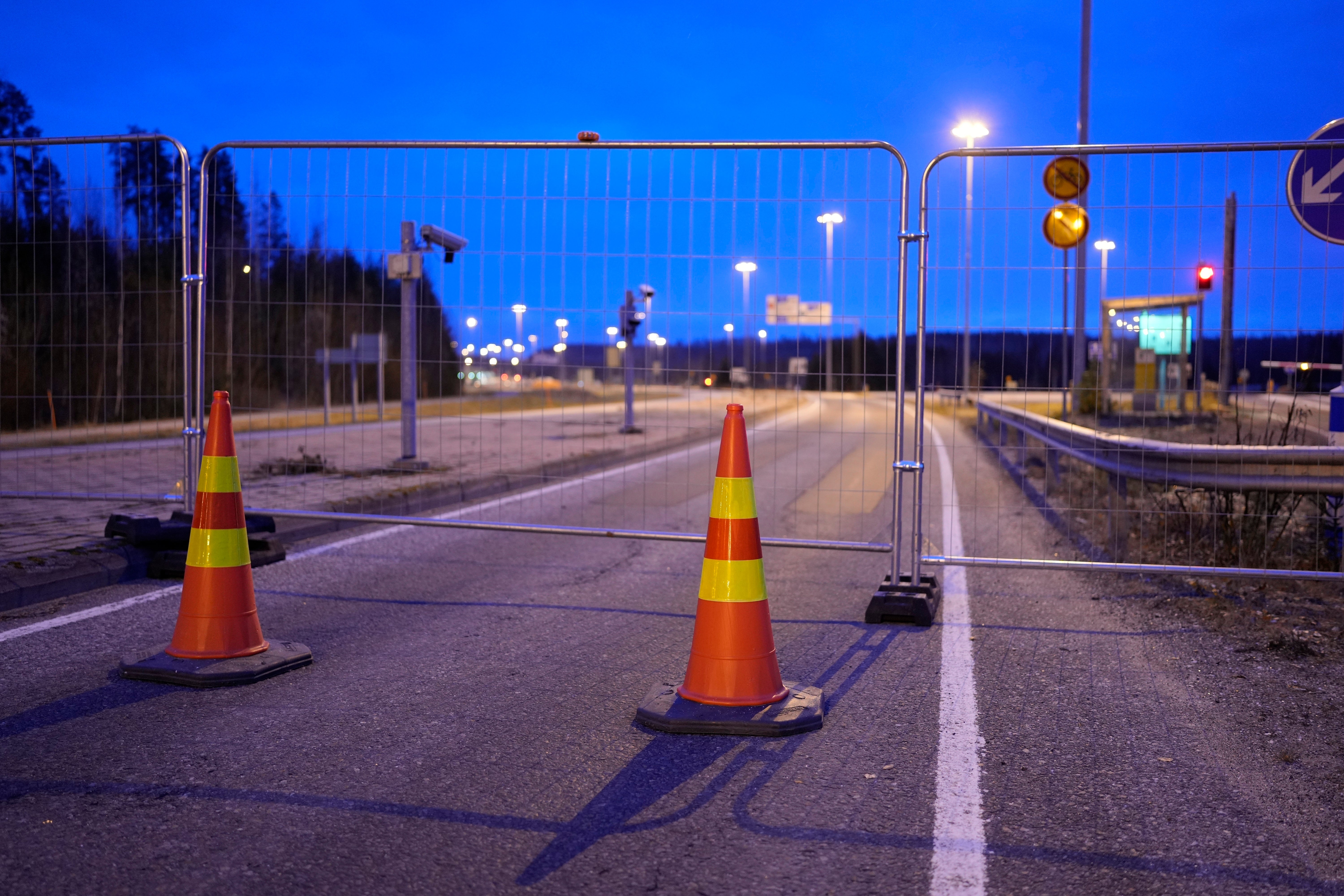 A view of a fence blocking the road to the closed empty Nuijamaa border station between Russia and Finland