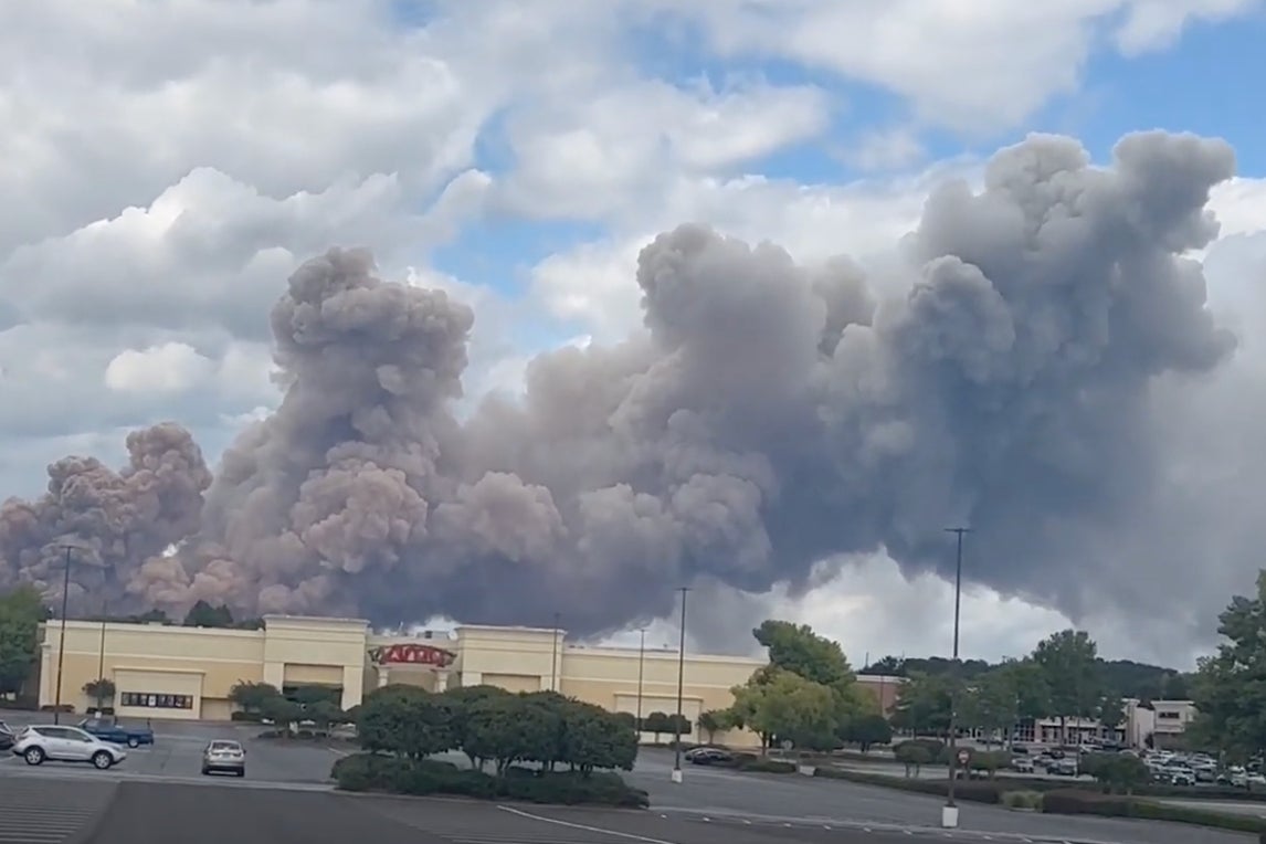 A large smoke plume formed in Conyers, Georgia after a fire at a chemical plant caused a large chemical reaction