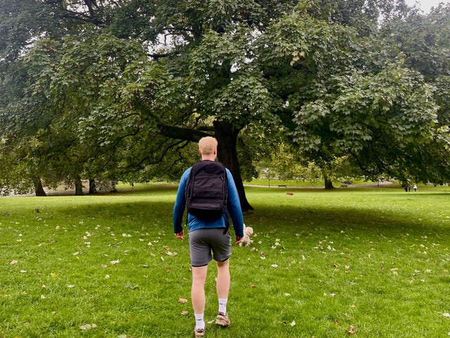 <p>The Independent’s fitness writer Harry Bullmore trying a rucking workout</p>