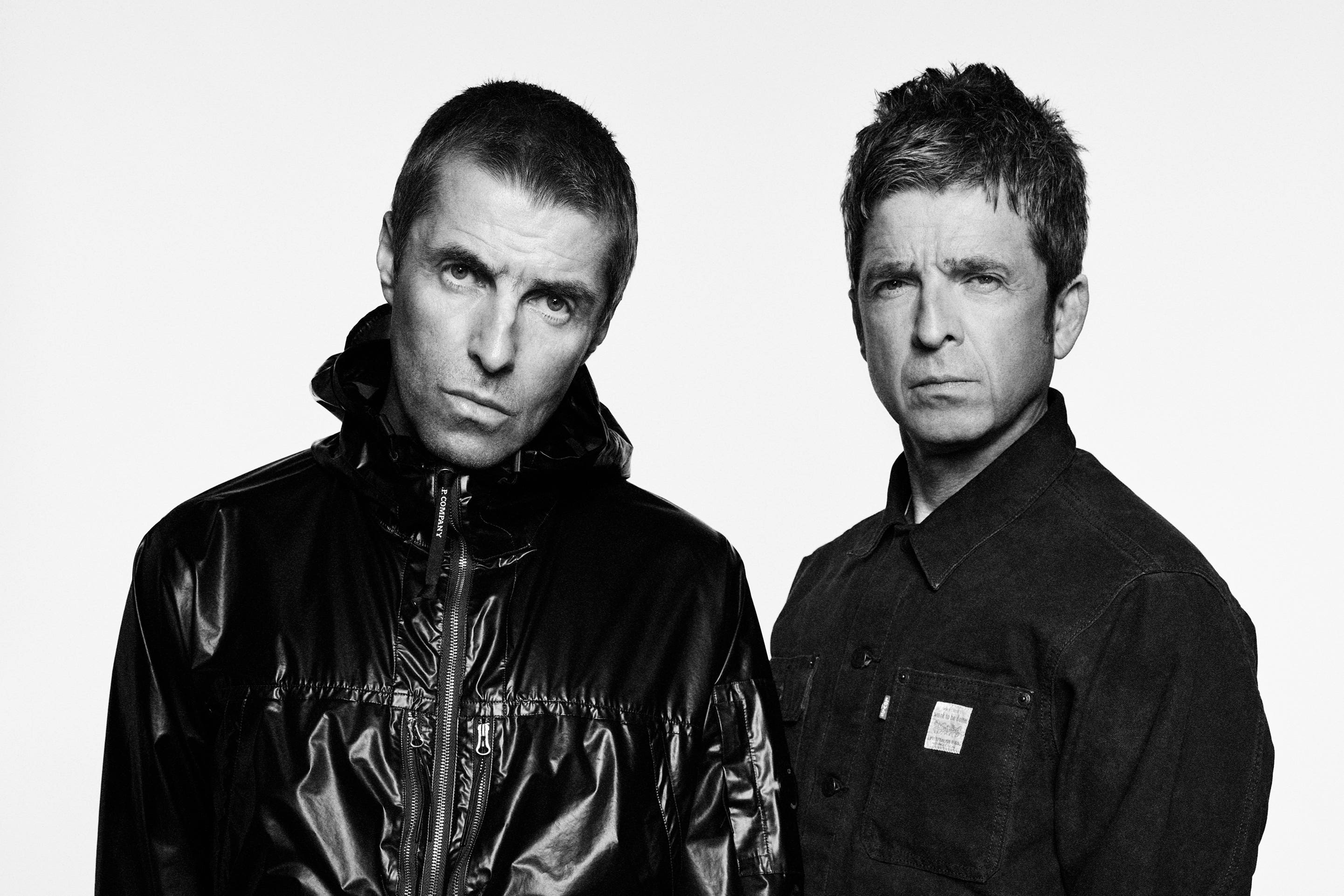 Liam Gallagher (left) and Noel Gallagher who have announced dates for their world tour (Simon Emmett/PA)