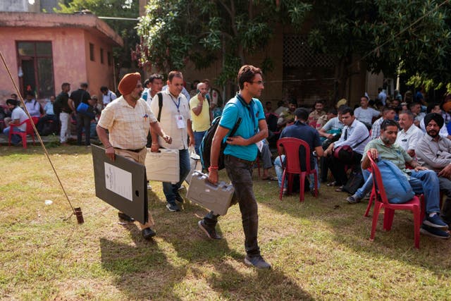 <p>File: Officials leave for poll duty with electronic voting machines and other election material on the eve of the third phase of the Jammu and Kashmir Assembly election, in Jammu, India, 30 September 2024</p>