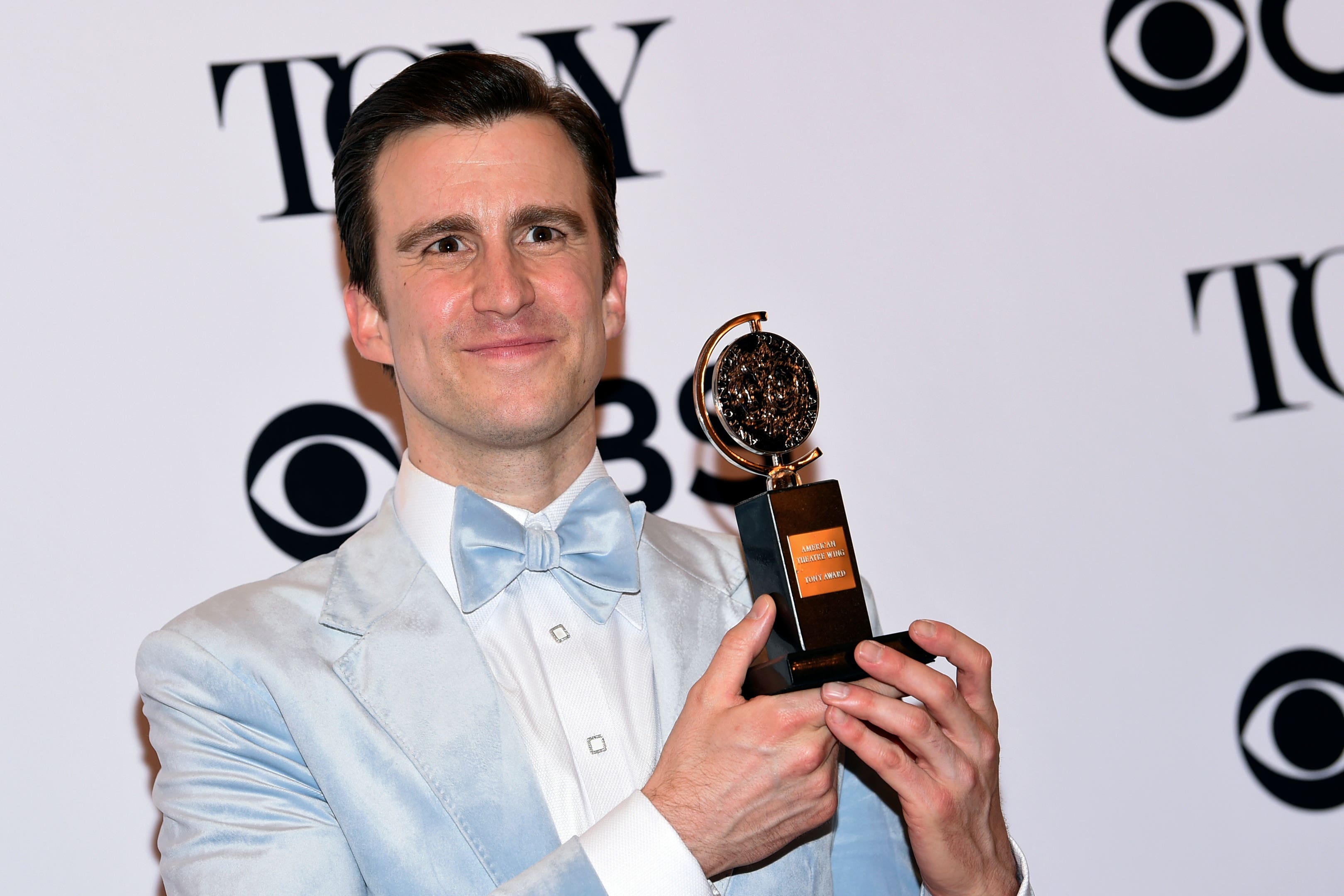 Gavin Creel, winner of the award for best performance by an actor in a featured role in a musical for Hello, Dolly! poses in the press room at the 71st annual Tony Awards in New York in 2017 (Evan Agostini/Invision/AP)