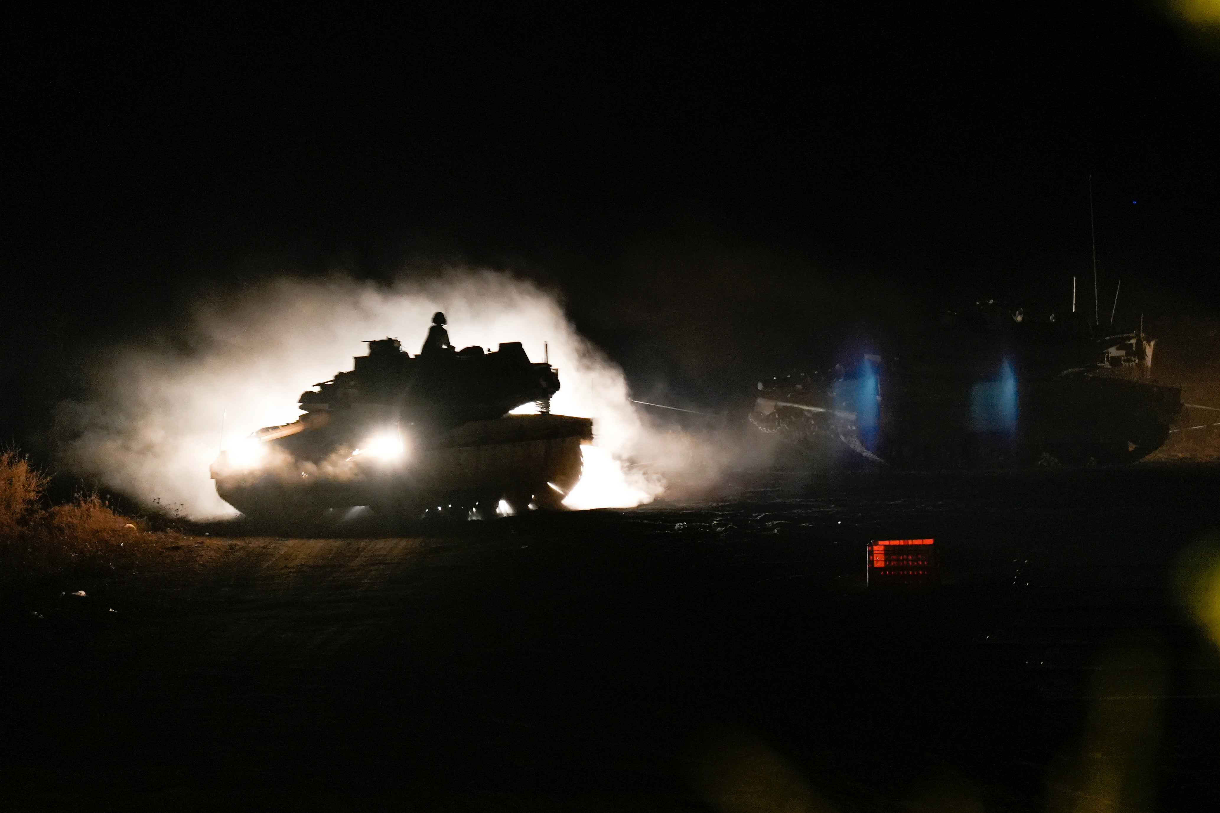 Israeli tanks were seen manoeuvring near the Israel-Lebanon border last night