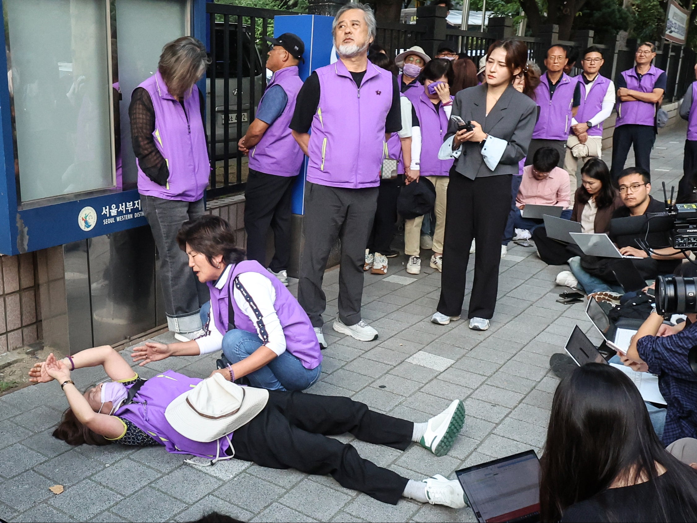 Bereaved family members of the victims of the Halloween crush in 2022 react at the Seoul Western District Court in Seoul, South Korea, Monday, 30 September 2024