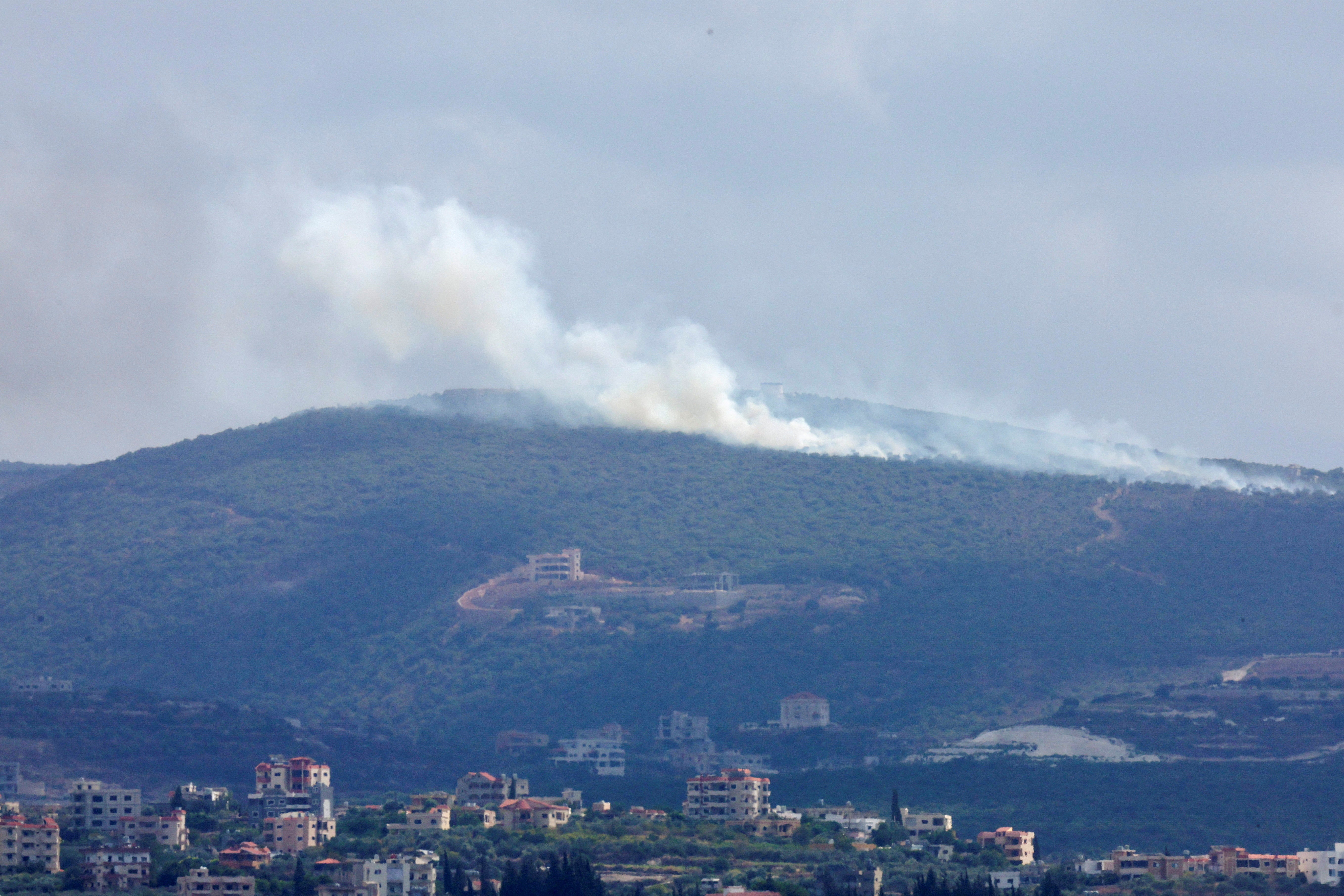 Smoke billows amid ongoing hostilities between Hezbollah and Israeli forces, as seen from Tyre, southern Lebanon