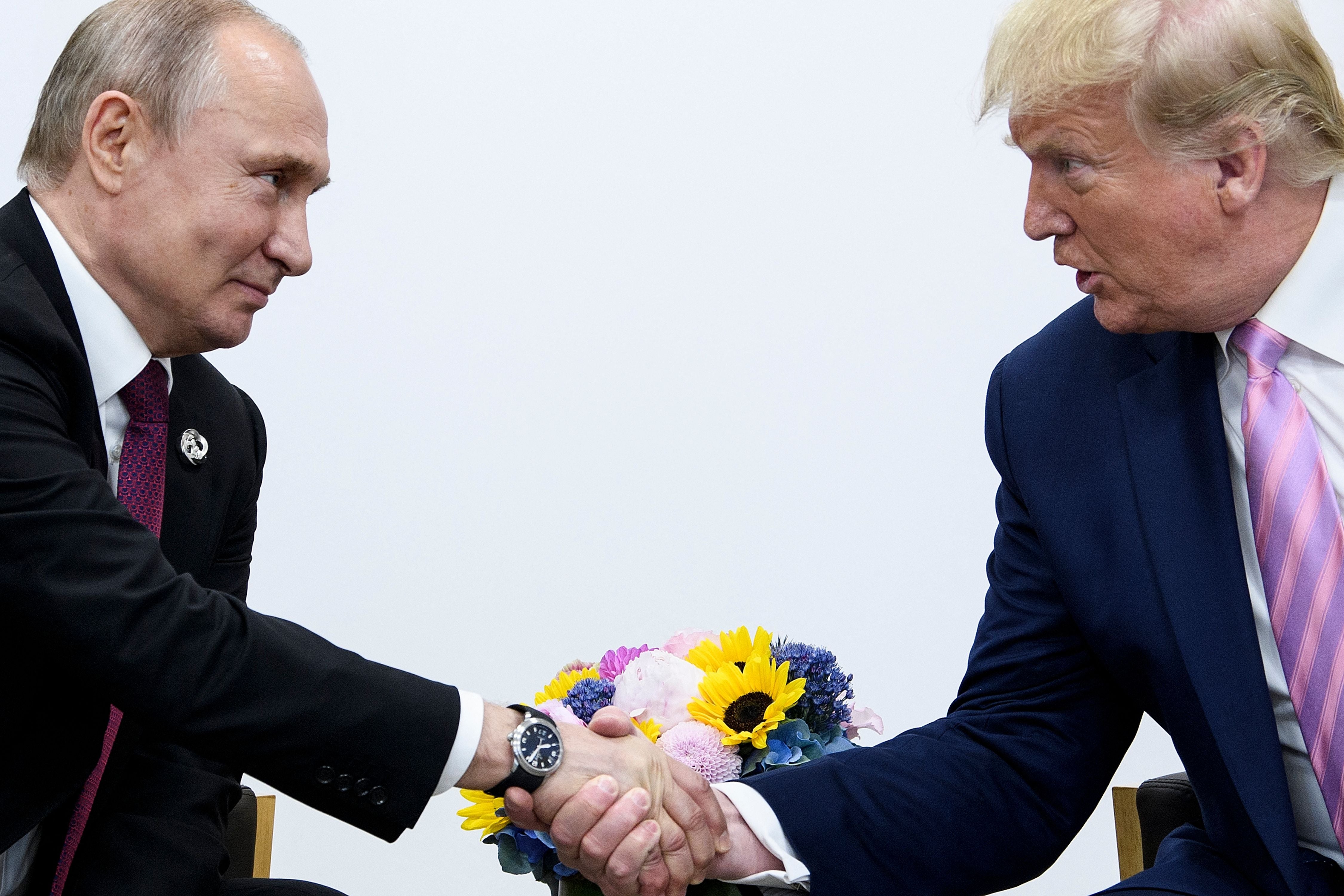 Vladimir Putin and Donald Trump at the G20 summit in Osaka, Japan, in 2019