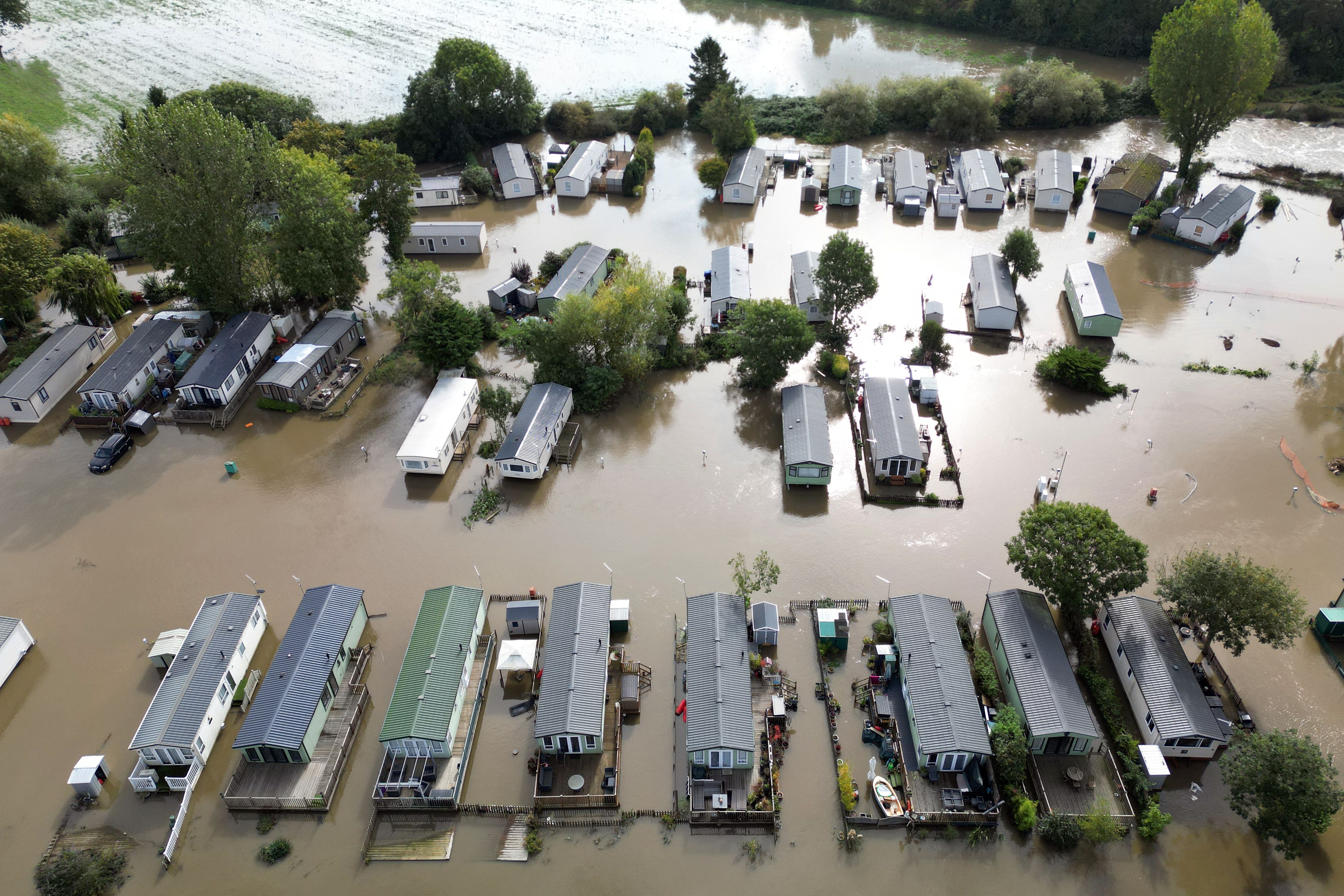 Cogenhoe Mill Holiday Park in Northamptonshire submerged by floodwater after the River Nene burst its banks (Joe Giddens/PA)