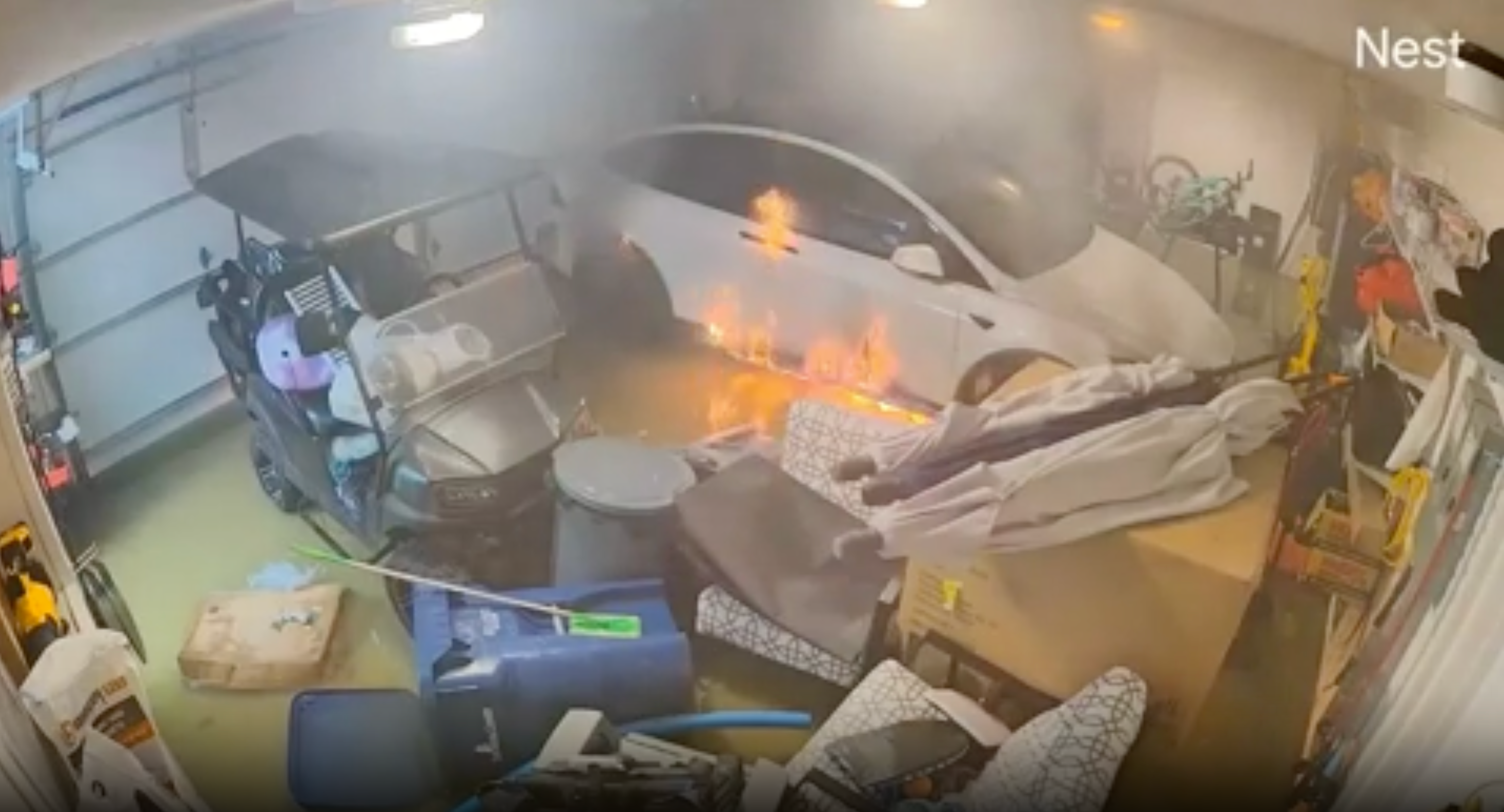 A Tesla bursts into flames in a Florida garage after being submerged in Hurricane Helene flooding