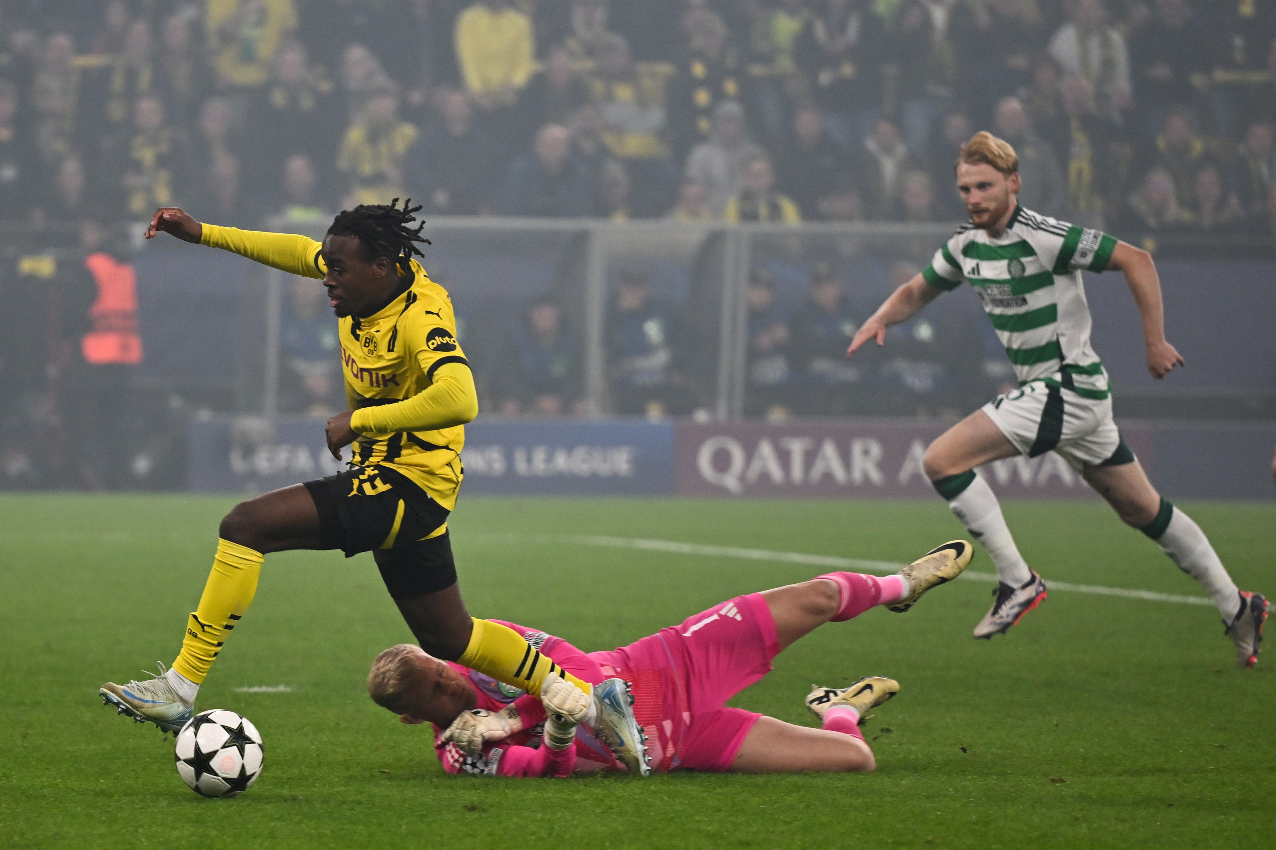 Dortmund’s Jamie Gittens was brought down by Kasper Schmeichel ahead of the early opener (PA Wire via DPA)