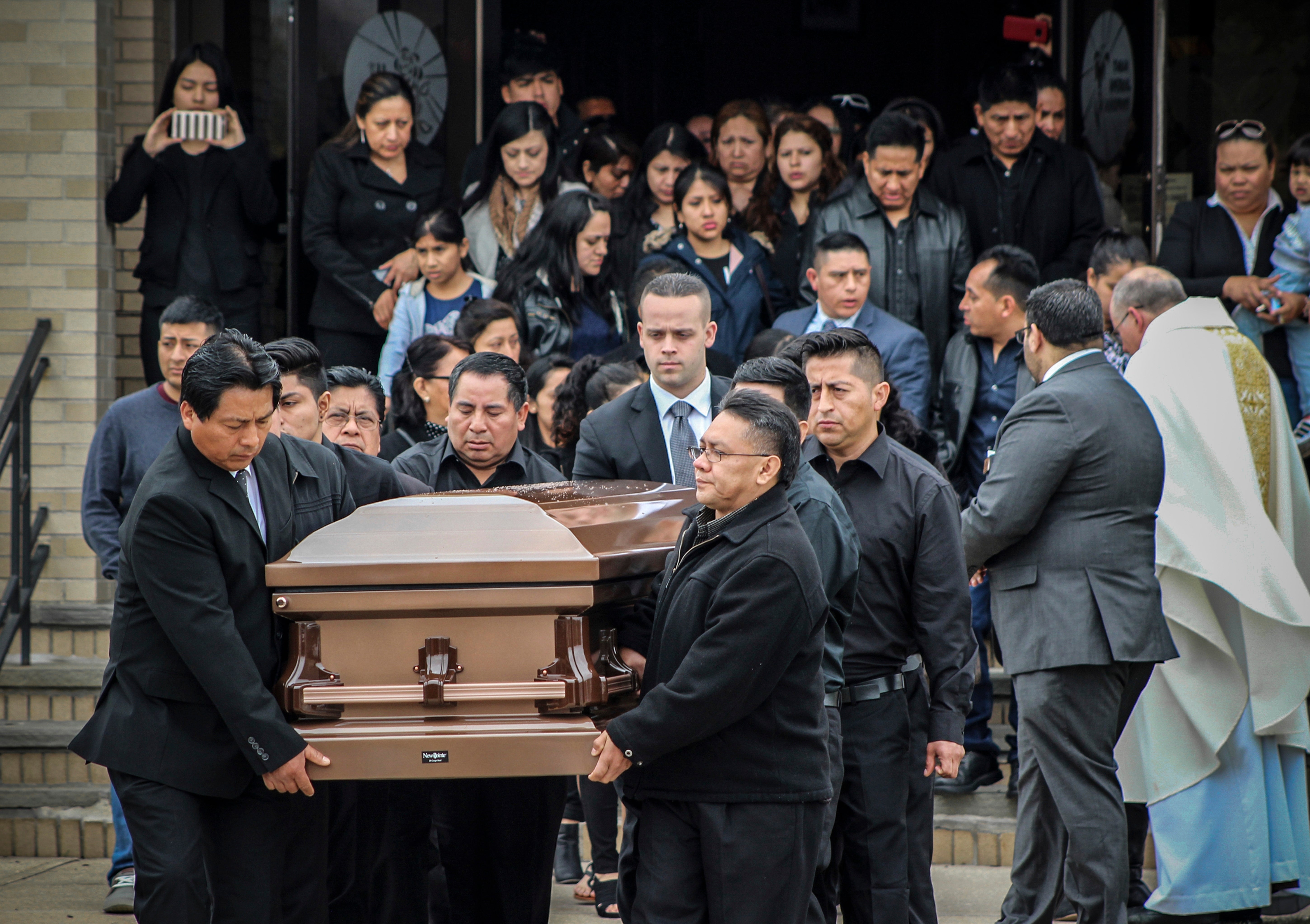 The casket of Justin Llivicura (pictured) following his murder by the MS-13 gang members