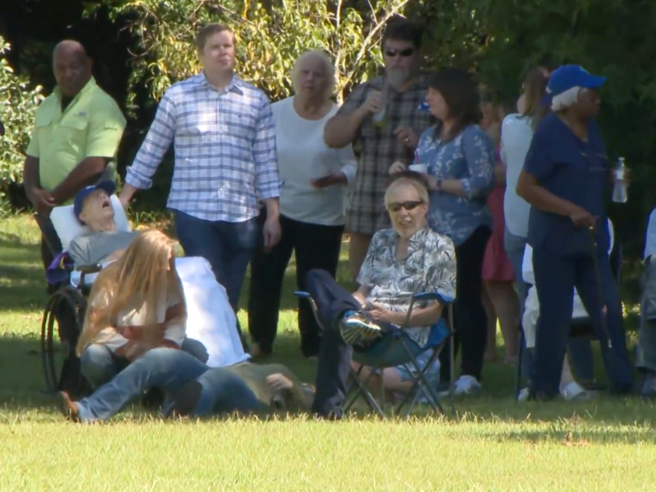 Jimmy Carter, pictured in a wheelchair, celebrates his 100th birthday in the backyard of his Plains, Georgia home, with his family and loved ones. The US military held a four-jet flyover of the property to honor the former president