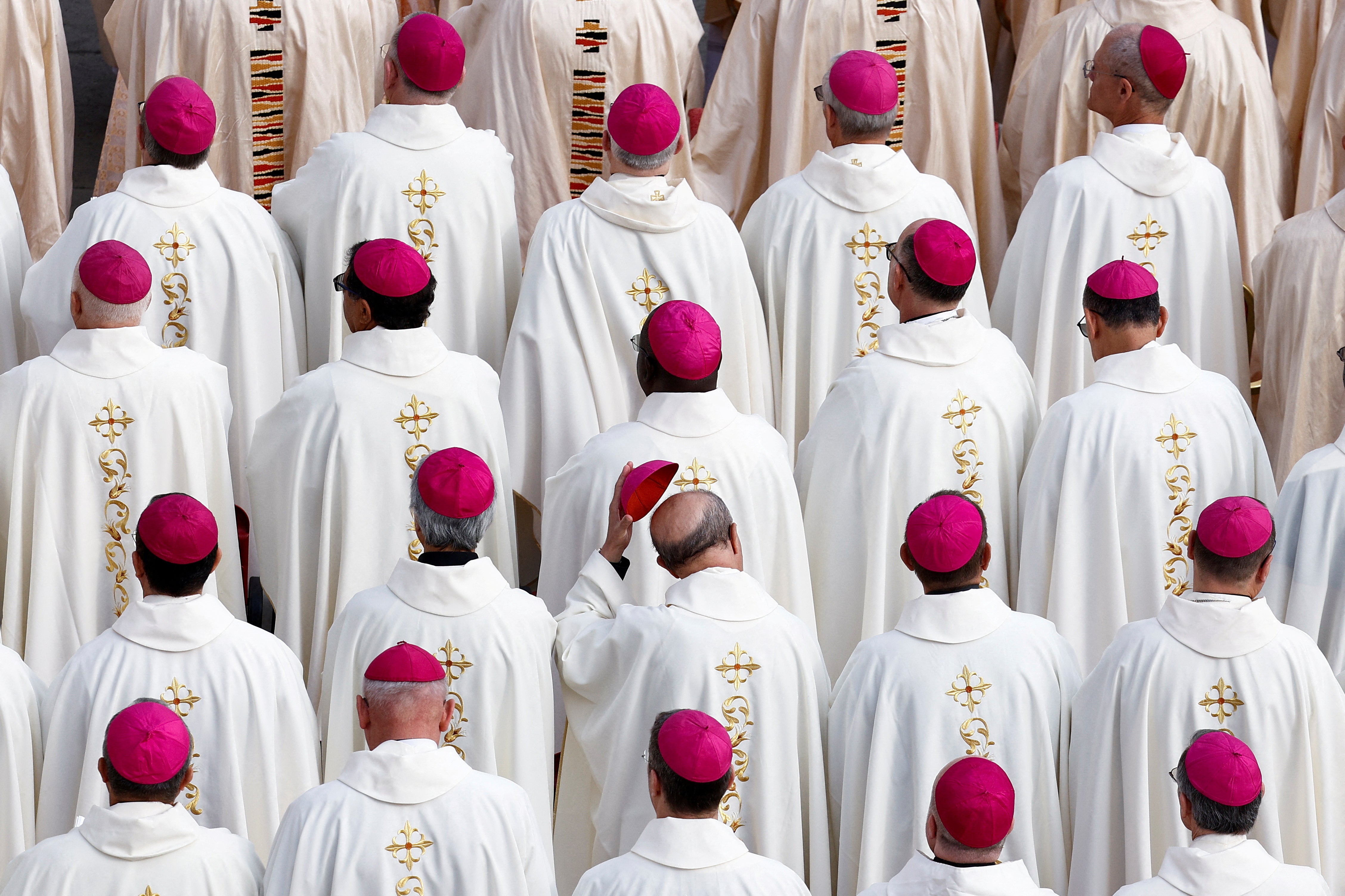 Bishops attend a mass led by Pope Francis to open the Synod of Bishops in St. Peter's Square at the Vatican