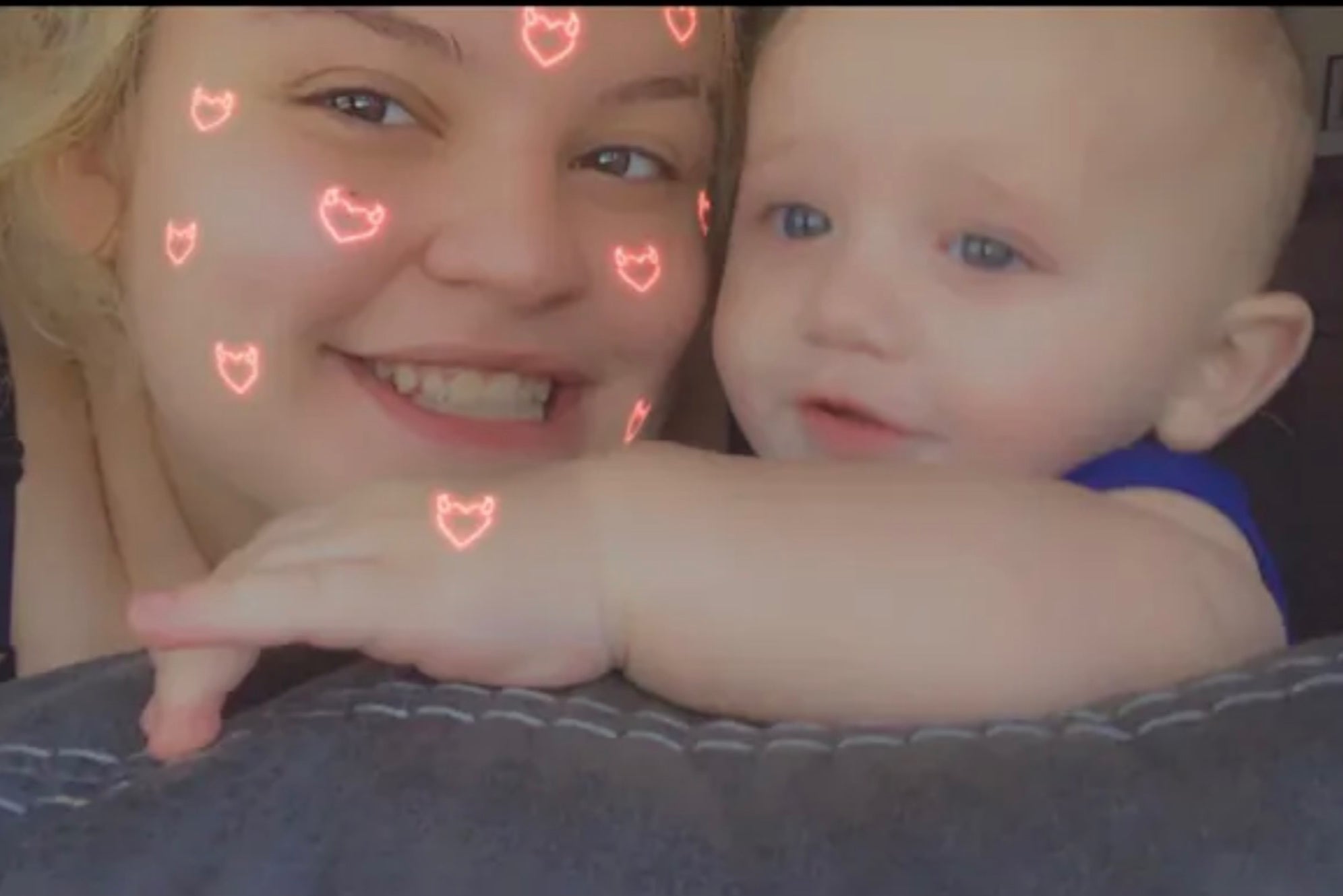 Chelsea Heugel, 23, and one of her children. Huegel died by suicide while in custody last month awaiting a court appearance in Detroit, Michigan