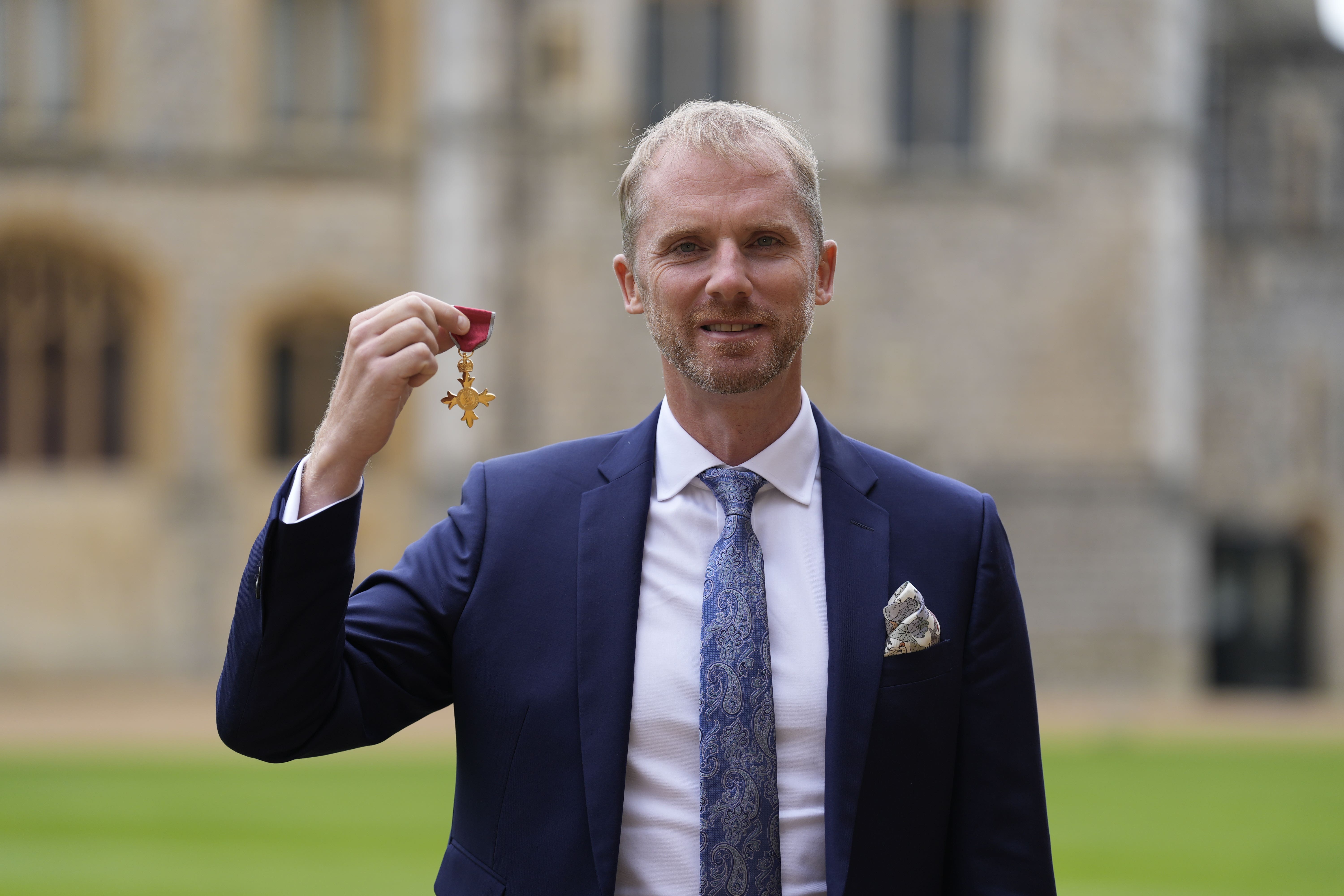 Wayne Barnes after being made an OBE during an investiture ceremony at Windsor Castle (Andrew Matthews/PA)