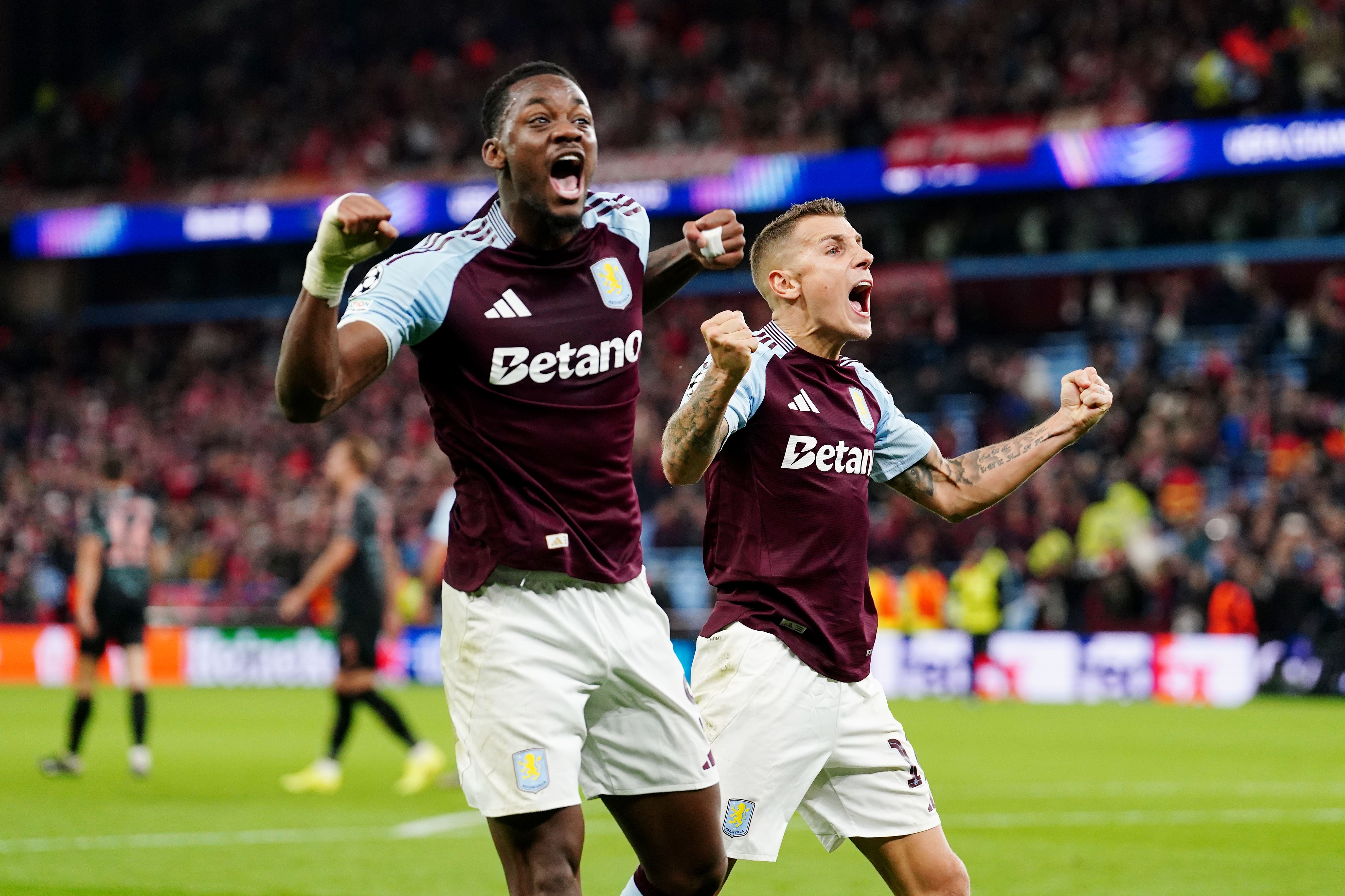 Jhon Duran (left) and Lucas Digne celebrate at the full-time whistle (David Davies/PA)