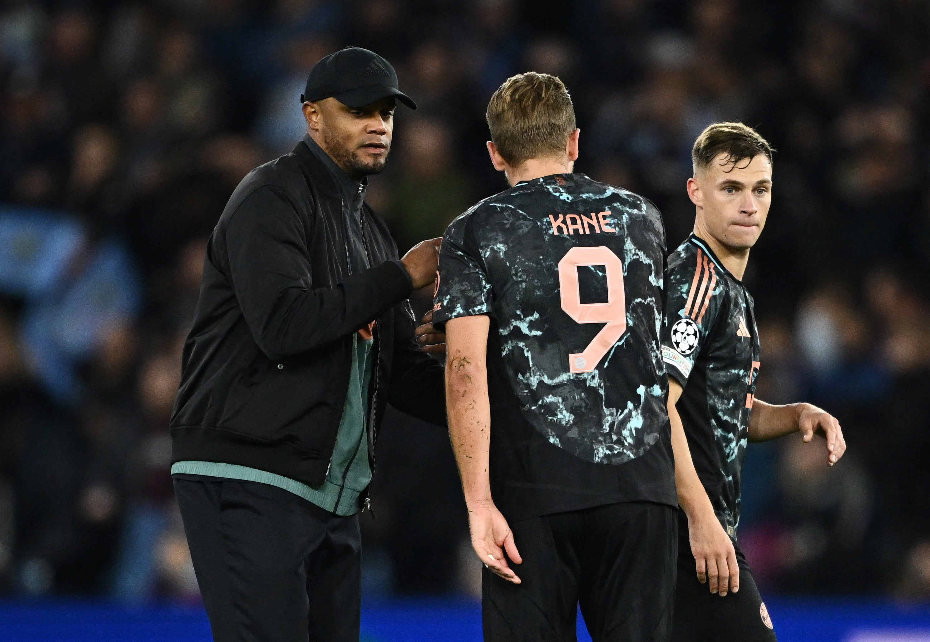 Bayern Munich manager Vincent Kompany consoles Harry Kane at full-time