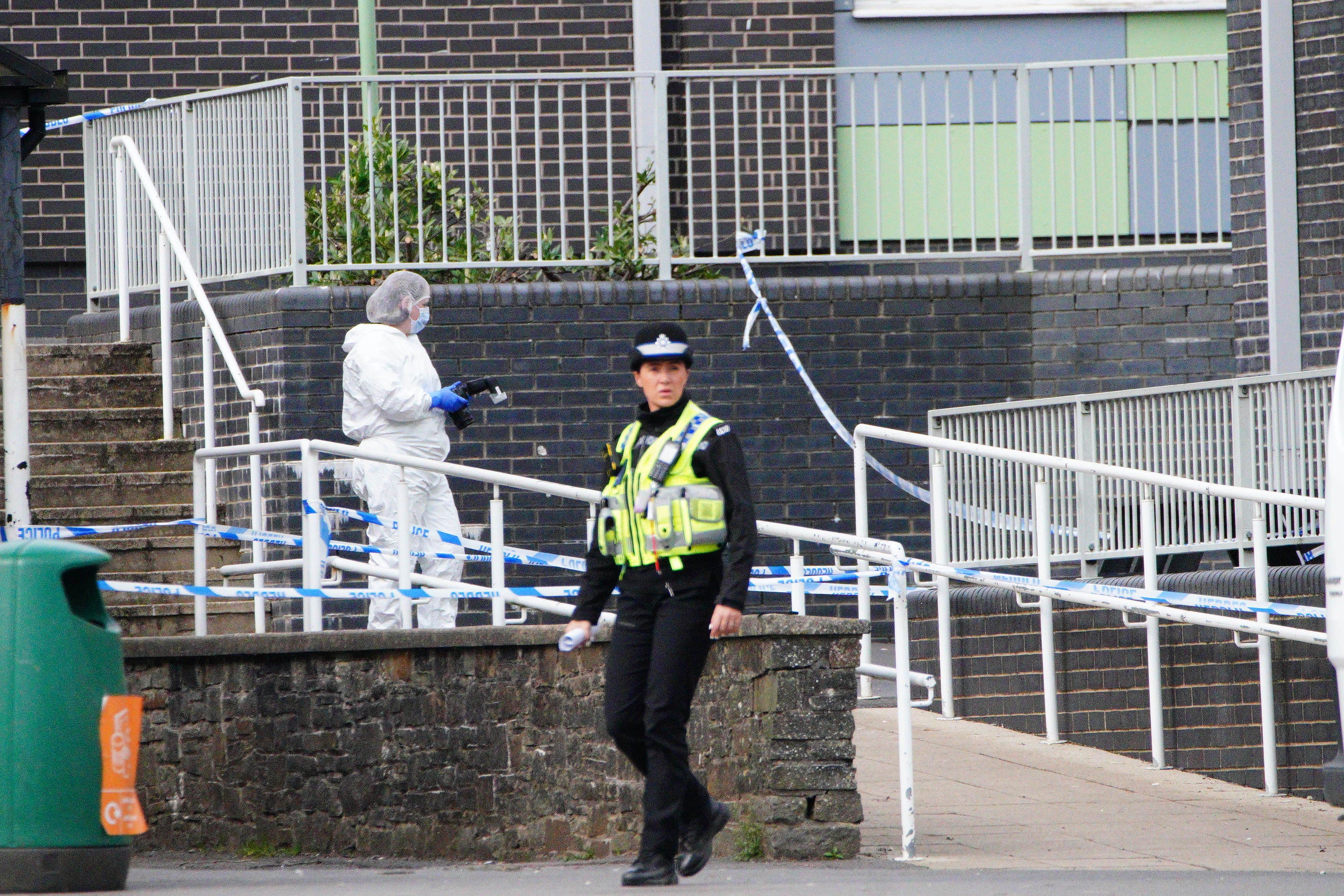 Police and Forensic investigators at Amman Valley school, in Ammanford, Carmarthenshire (Ben Birchall/PA)