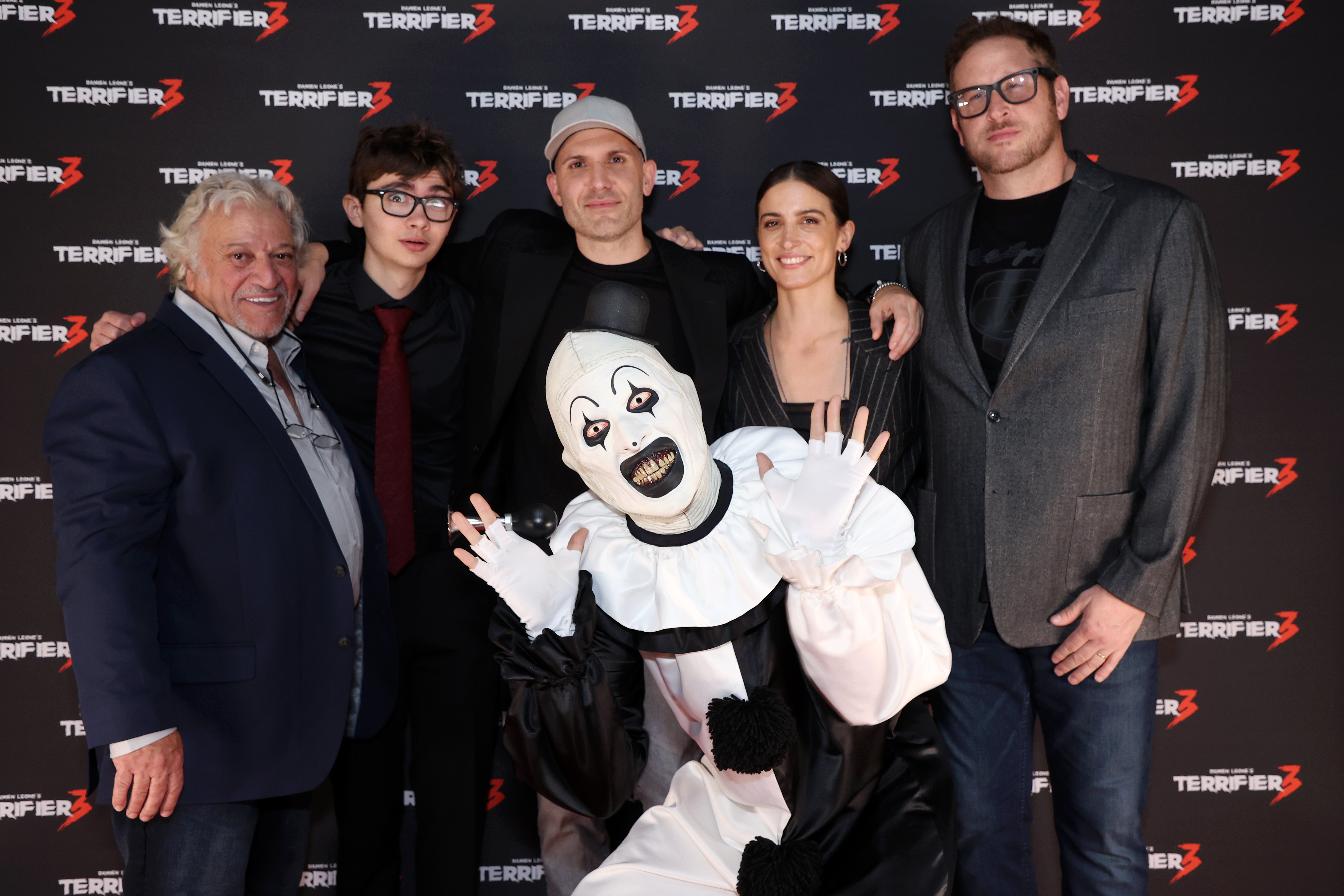 Phil Falcone, Elliot Fullam, Damien Leone, Samantha Scaffidi and George Steuber attend the UK gala screening of 'Terrifier 3' at Vue Leicester Square