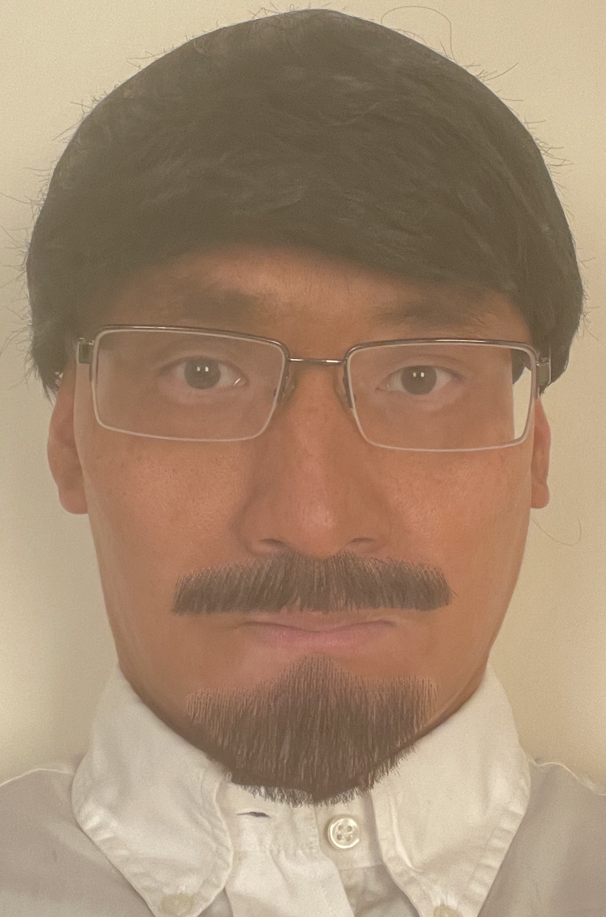 Undated handout photo issued by Northumbria Police of 53-year-old GP Thomas Kwan, wearing a disguise. The photo was found on the computer he used to make a fake ID card