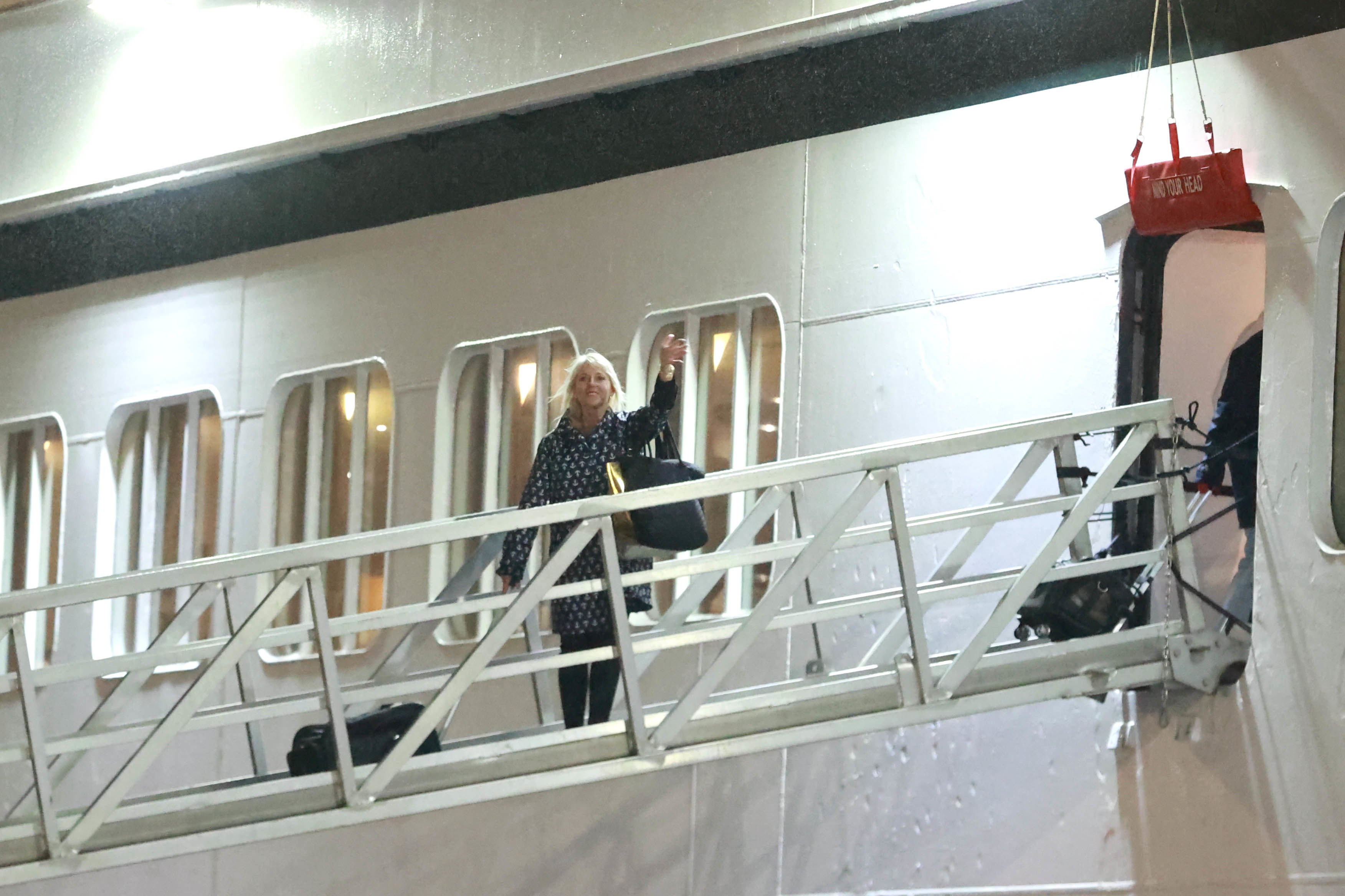 Passenger Holly Hennessey boards the Villa Vie Odyssey cruise ship at Belfast’s cruise ship terminal