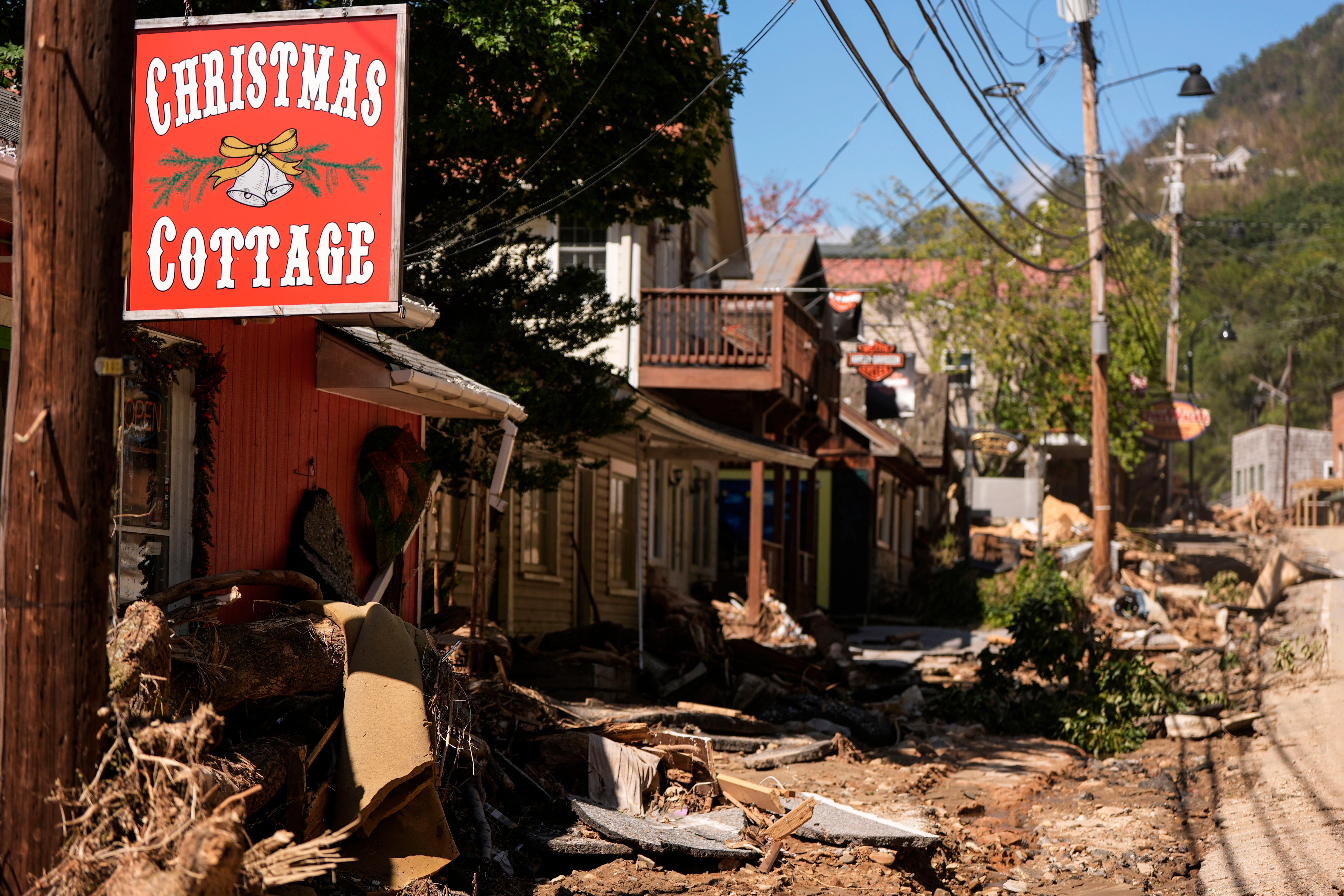 Businesses surrounded by debris in the aftermath of Hurricane Helene in Chimney Rock Village, North Carolina