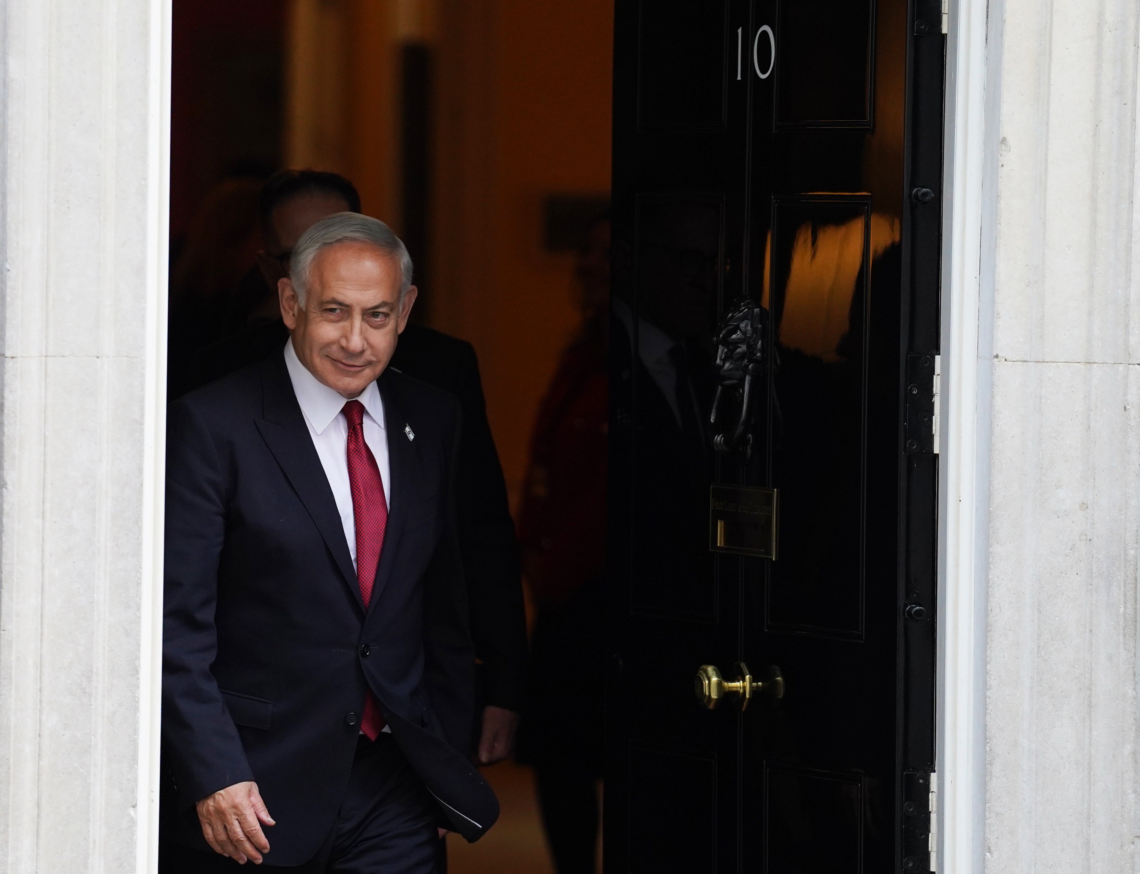 Israeli Prime Minister Benjamin Netanyahu leaves 10 Downing Street, London, following a meeting with Prime Minister Rishi Sunak (Stefan Rousseau/PA)