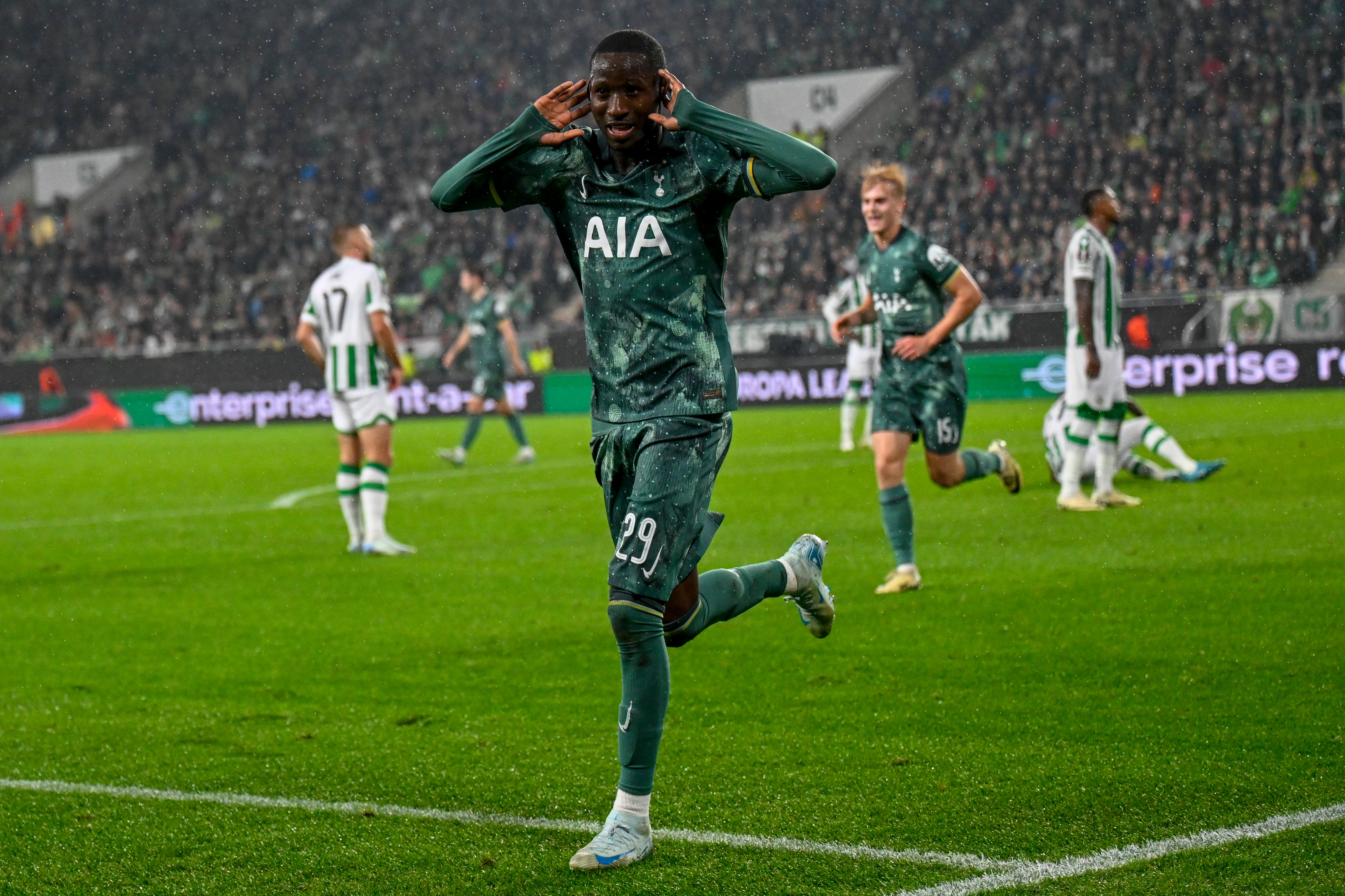 Pape Sarr celebrates Tottenham’s first goal (Denes Erdos/AP)