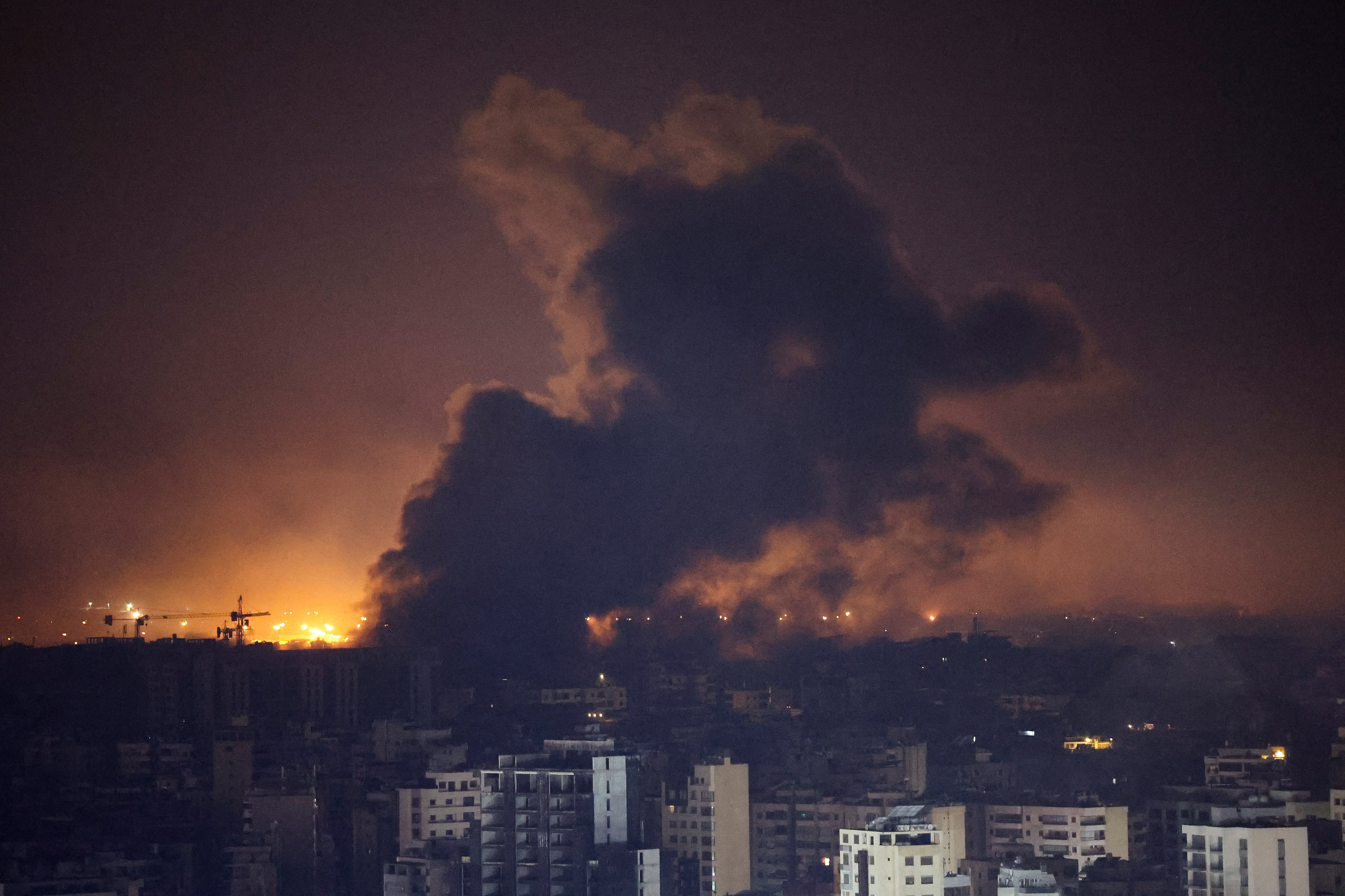 Smoke rises over Beirut’s southern suburbs after a strike near Beirut-Rafic Hariri International Airport