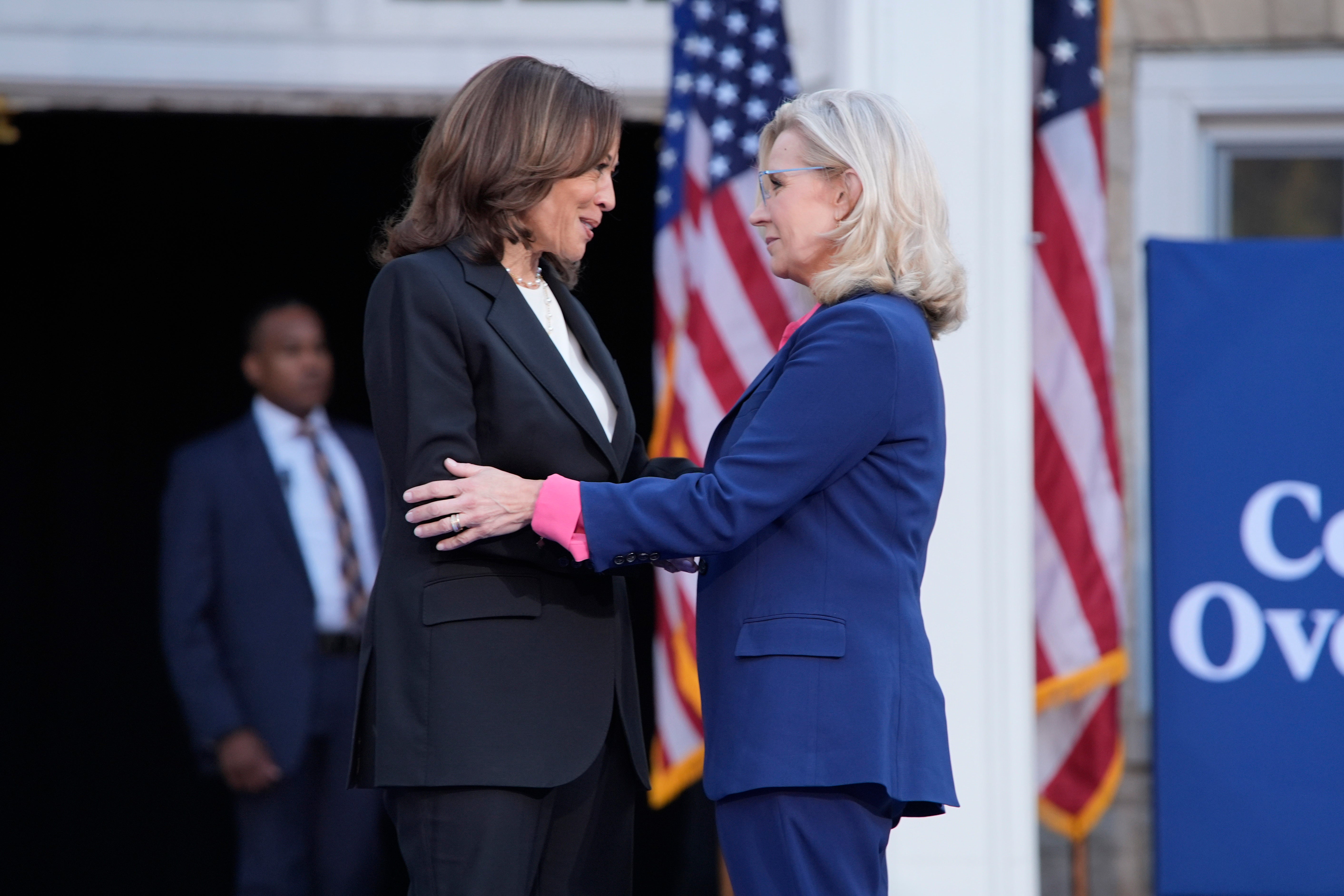 Former congresswoman Liz Cheney greets Kamala Harris at a campaign event at Ripon College in Wisconsin