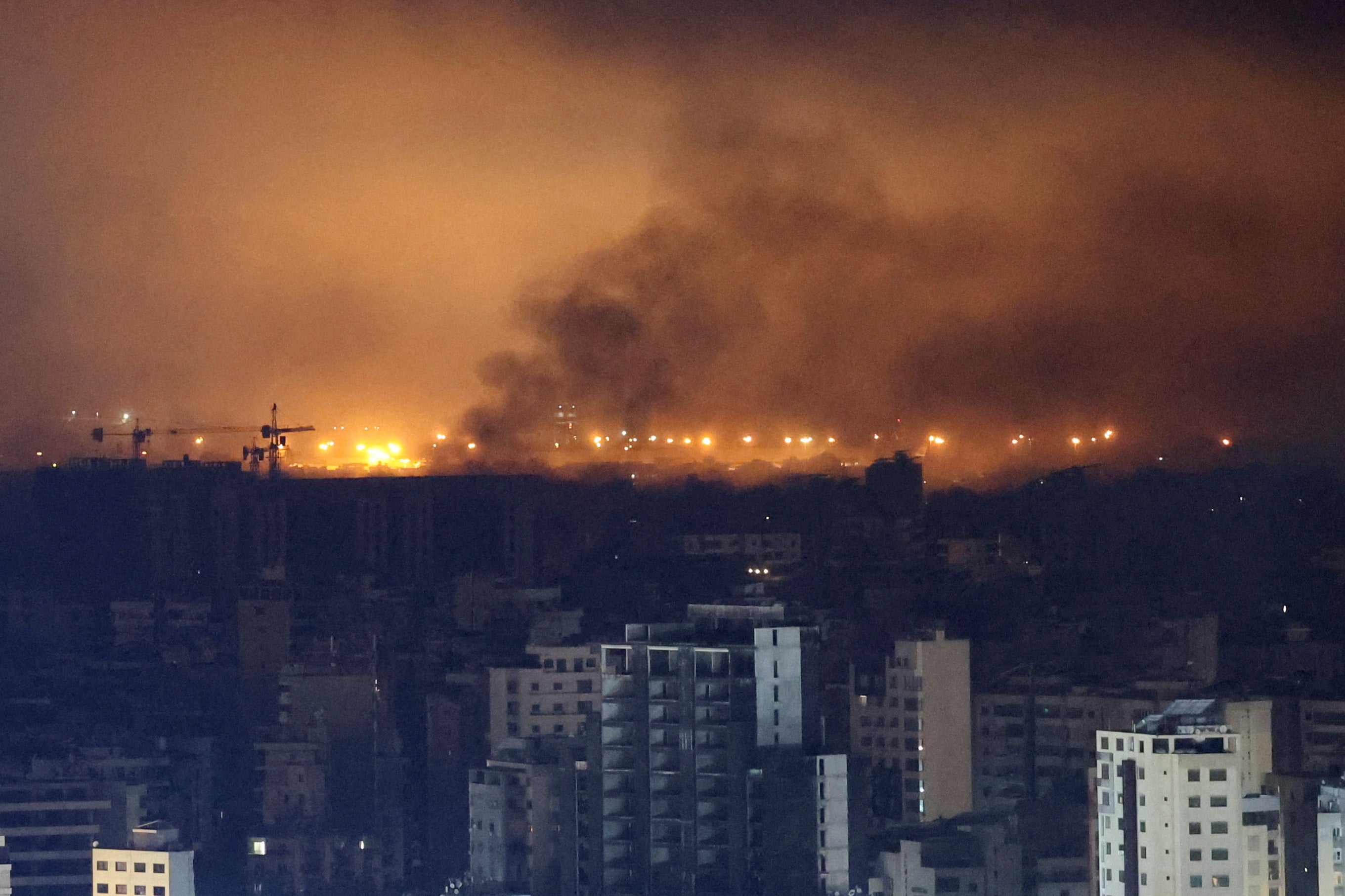 Smoke rises over Beirut’s southern suburbs after a strike near Beirut-Rafic Hariri International Airport