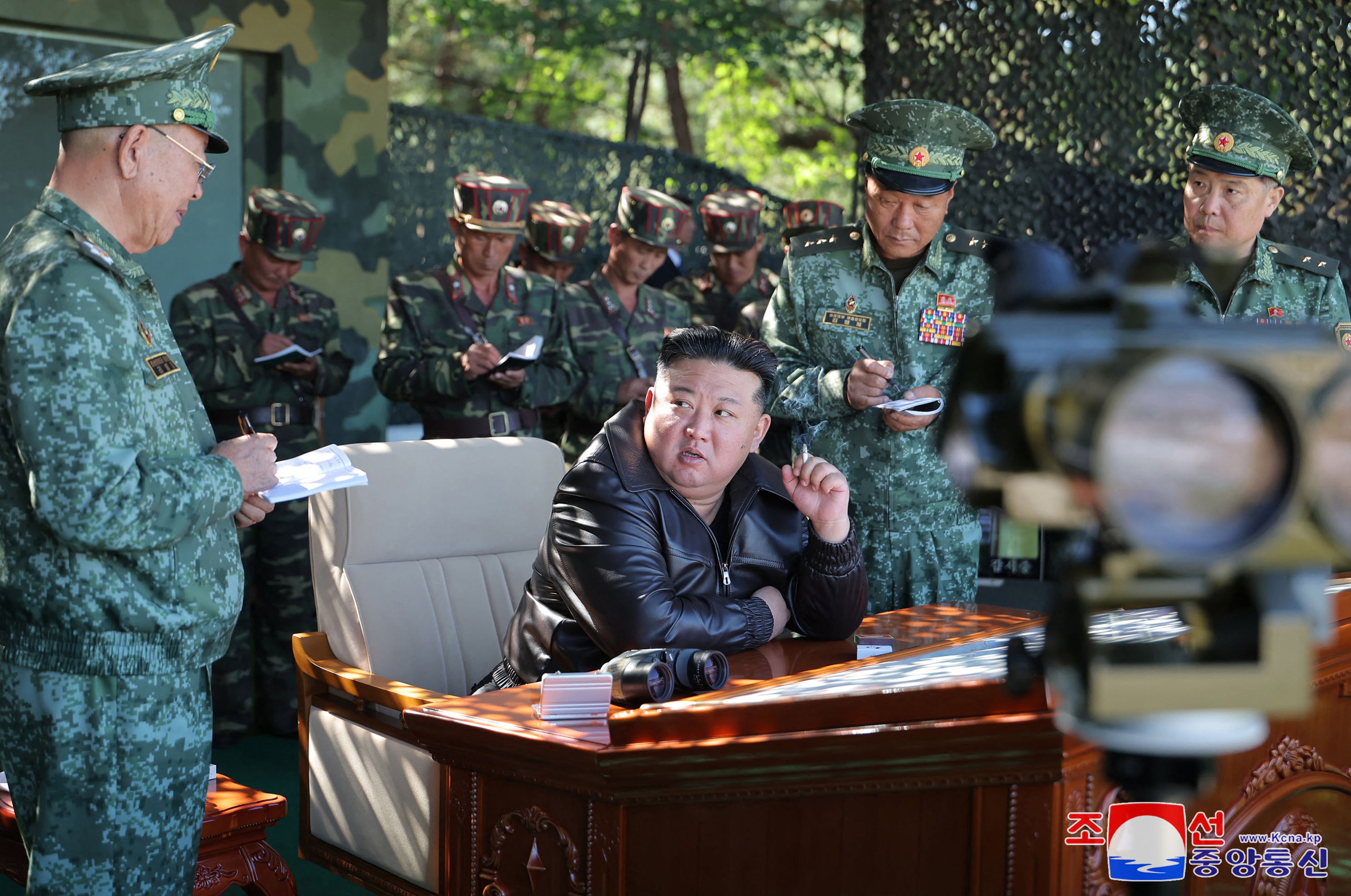 This picture taken on 2 October 2024 and released from North Korea's official Korean Central News Agency (KCNA) via KNS on 4 October 2024 shows North Korea's leader Kim Jong-un (C) inspecting a training base of the Korean People's Army's special operations forces in the western region, at an undisclosed location in North Korea