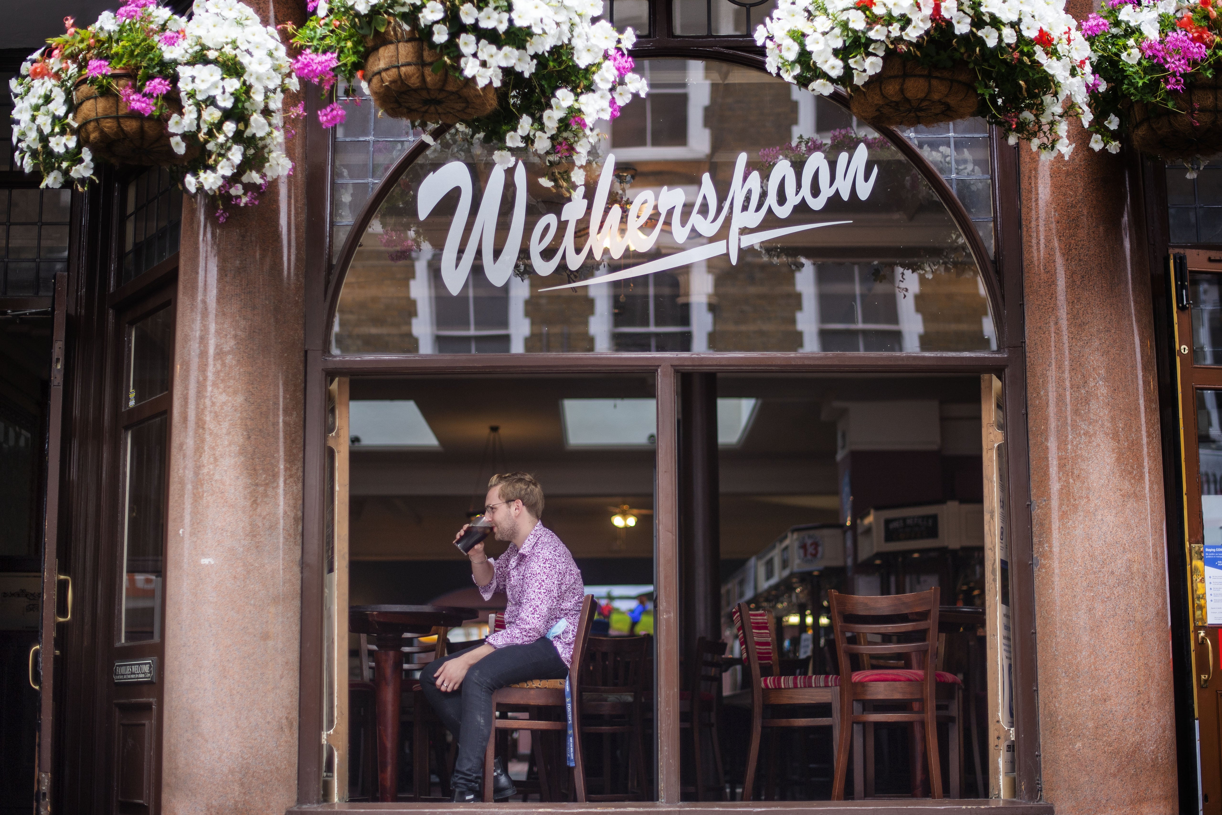 Pub chain JD Wetherspoon has revealed stronger profits for the past year (Victoria Jones/PA)