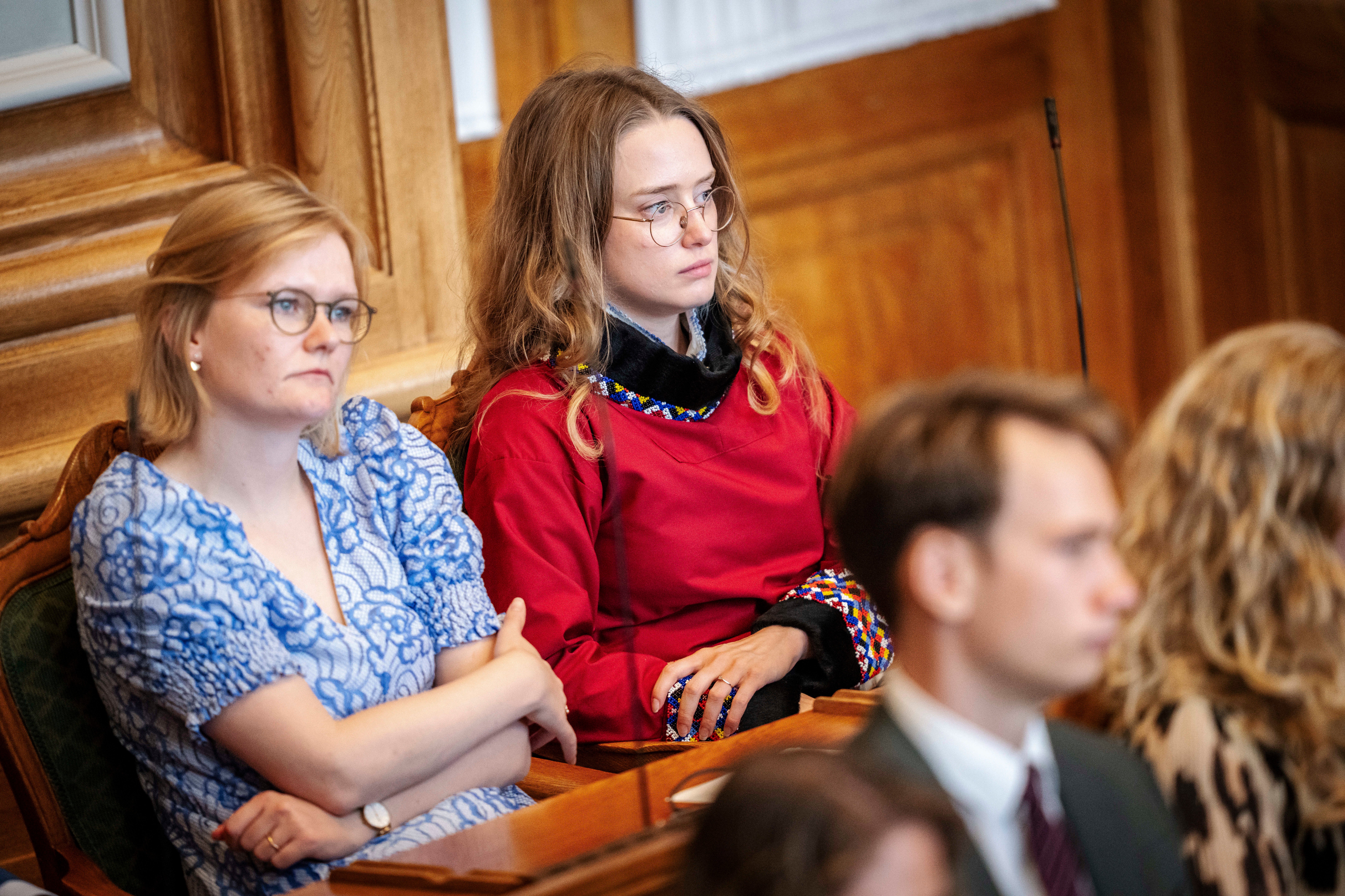 Lawmaker Aki-Matilda Hoeegh-Dam, top right, representing Greenland, attends the opening of the Folketing, which is also the beginning of a new parliamentary year, at Christiansborg in Copenhagen, Tuesday, Oct. 1, 2024