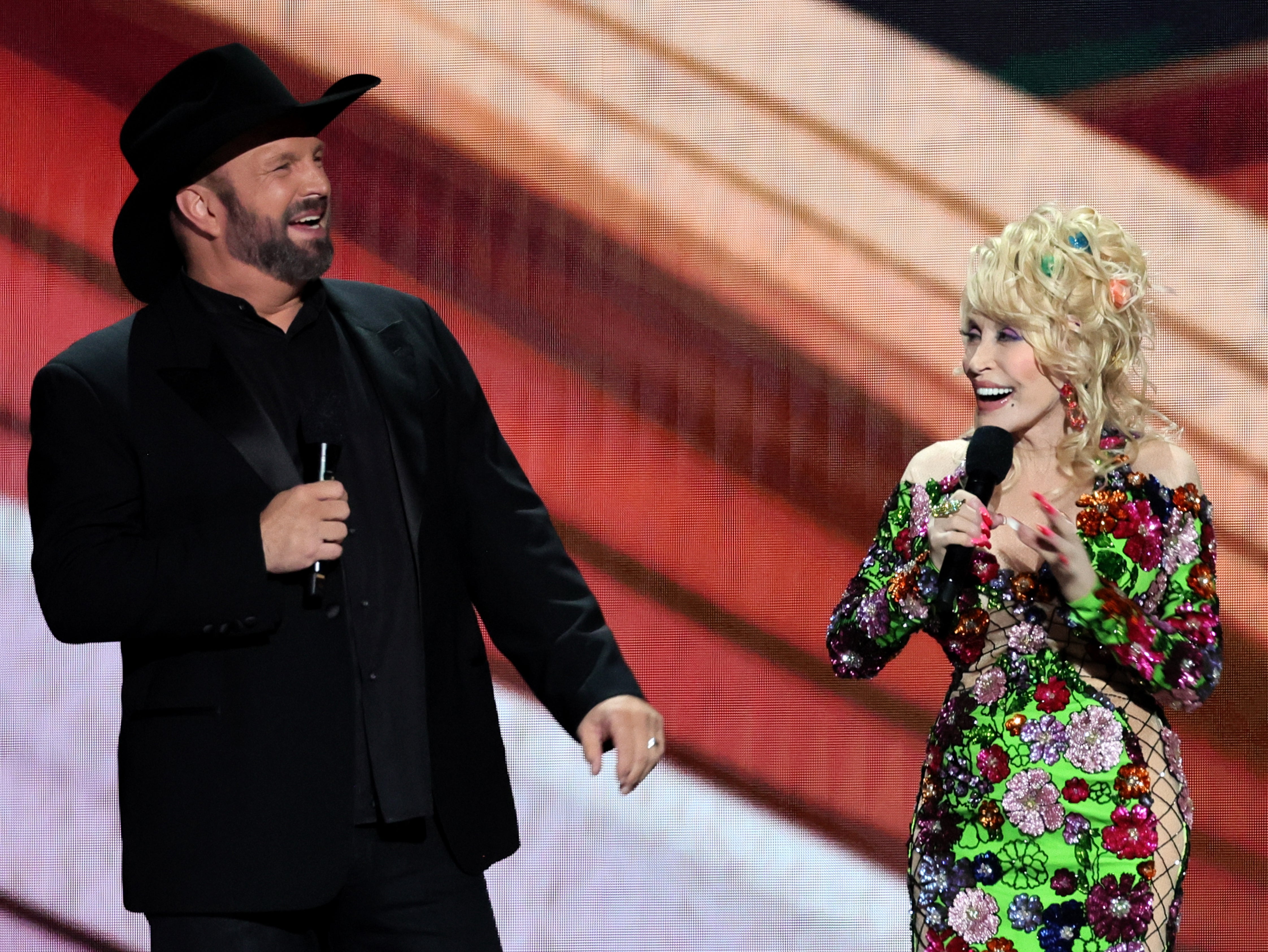 Garth Brooks with co-host Dolly Parton at the Country Music Awards in 2023